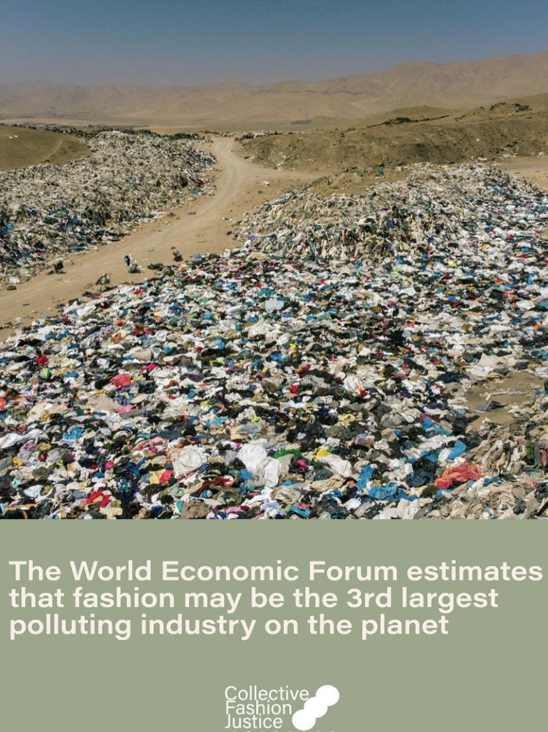 an unpaved road divides a large landfill with mounds of clothes