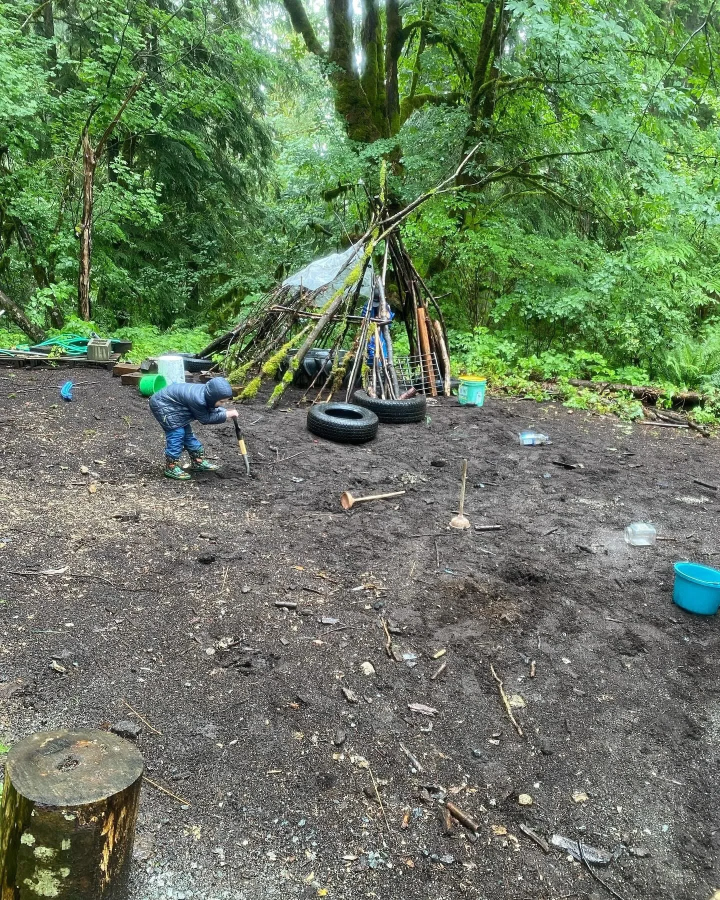 sticks formed into a tripod for a shelter