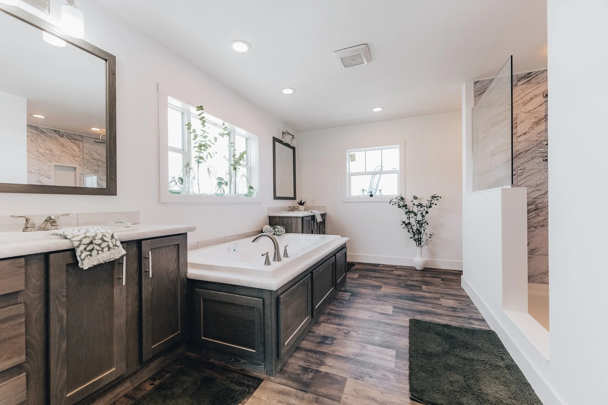 masterbathroom with walkin tiled shower and big shoaker tub