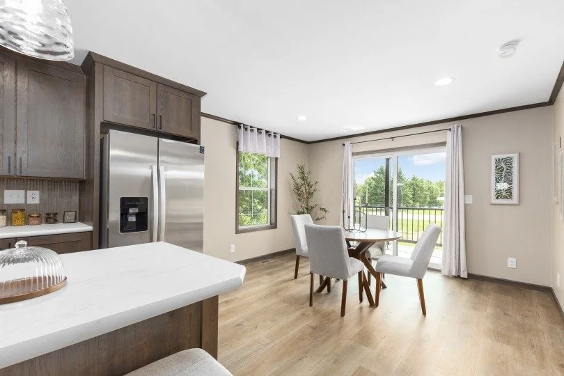 photo of the dinning room with sliding glass door in cavco westlake manufactured home 