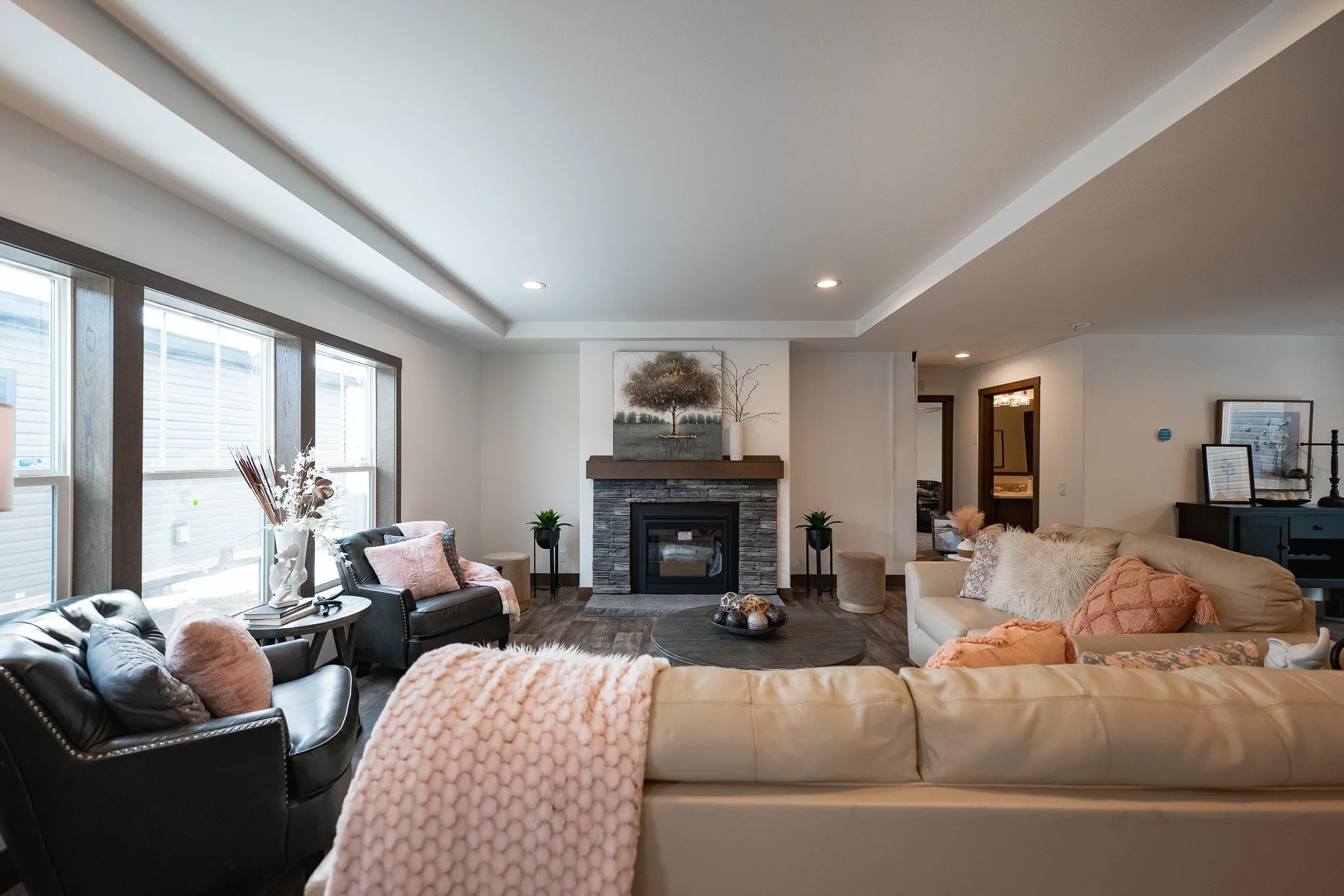 livingroom photo with fireplace in photo inside the schult legend custom 