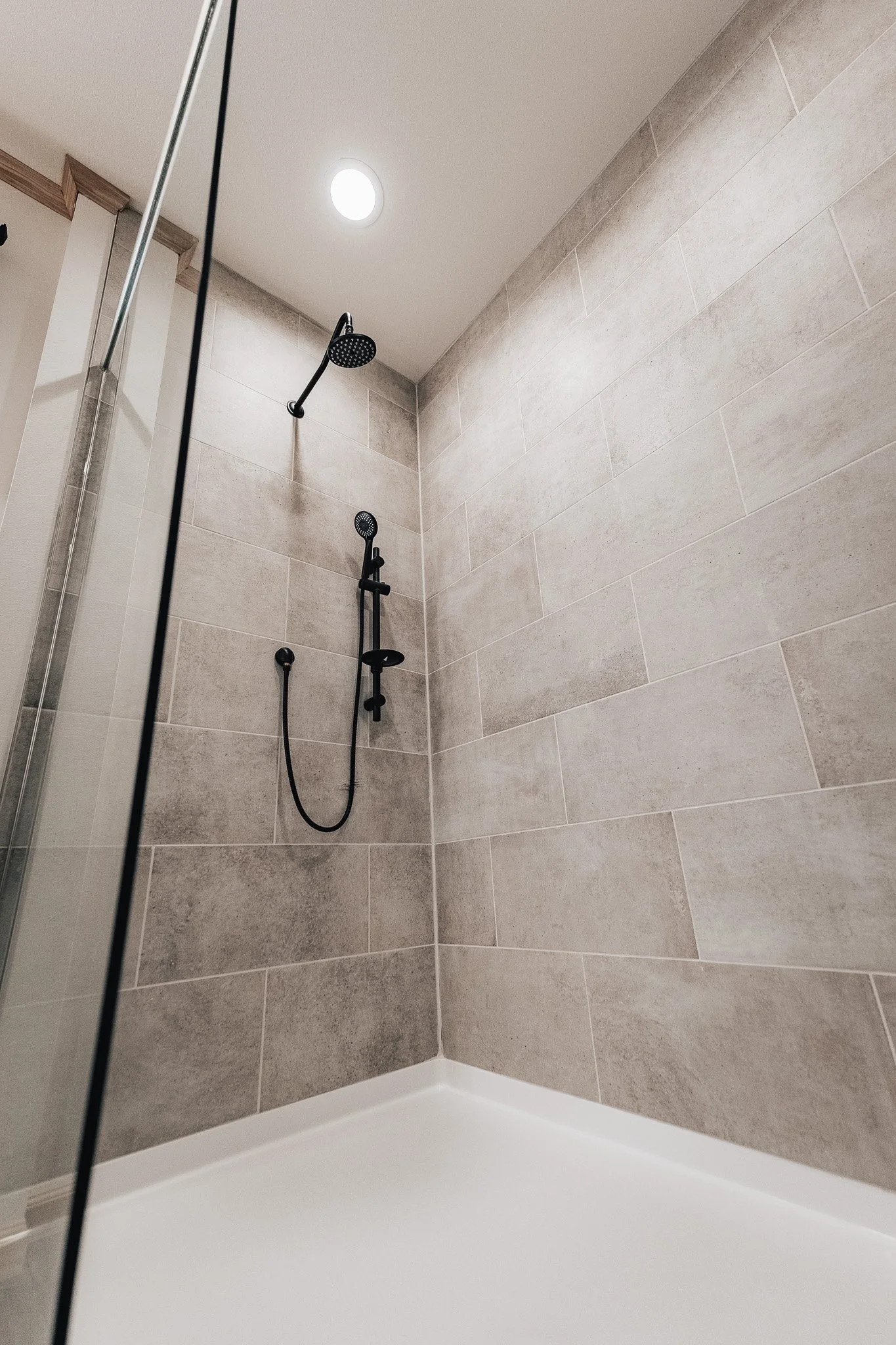 walk in tiled shower in the cavco dakota edge manufactured home