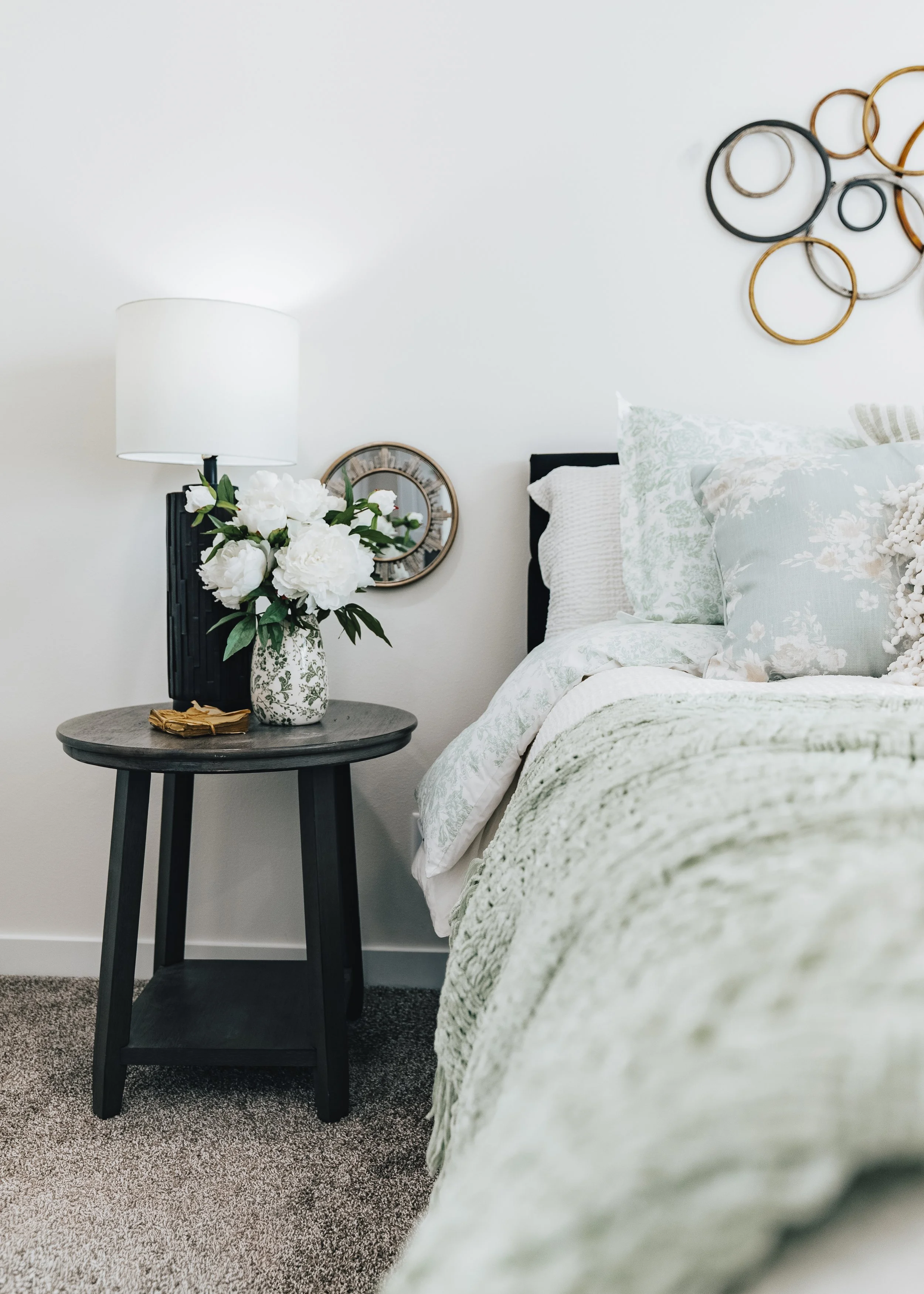 master bed with night stand in view inside the cavco farmhouse manufactured home 