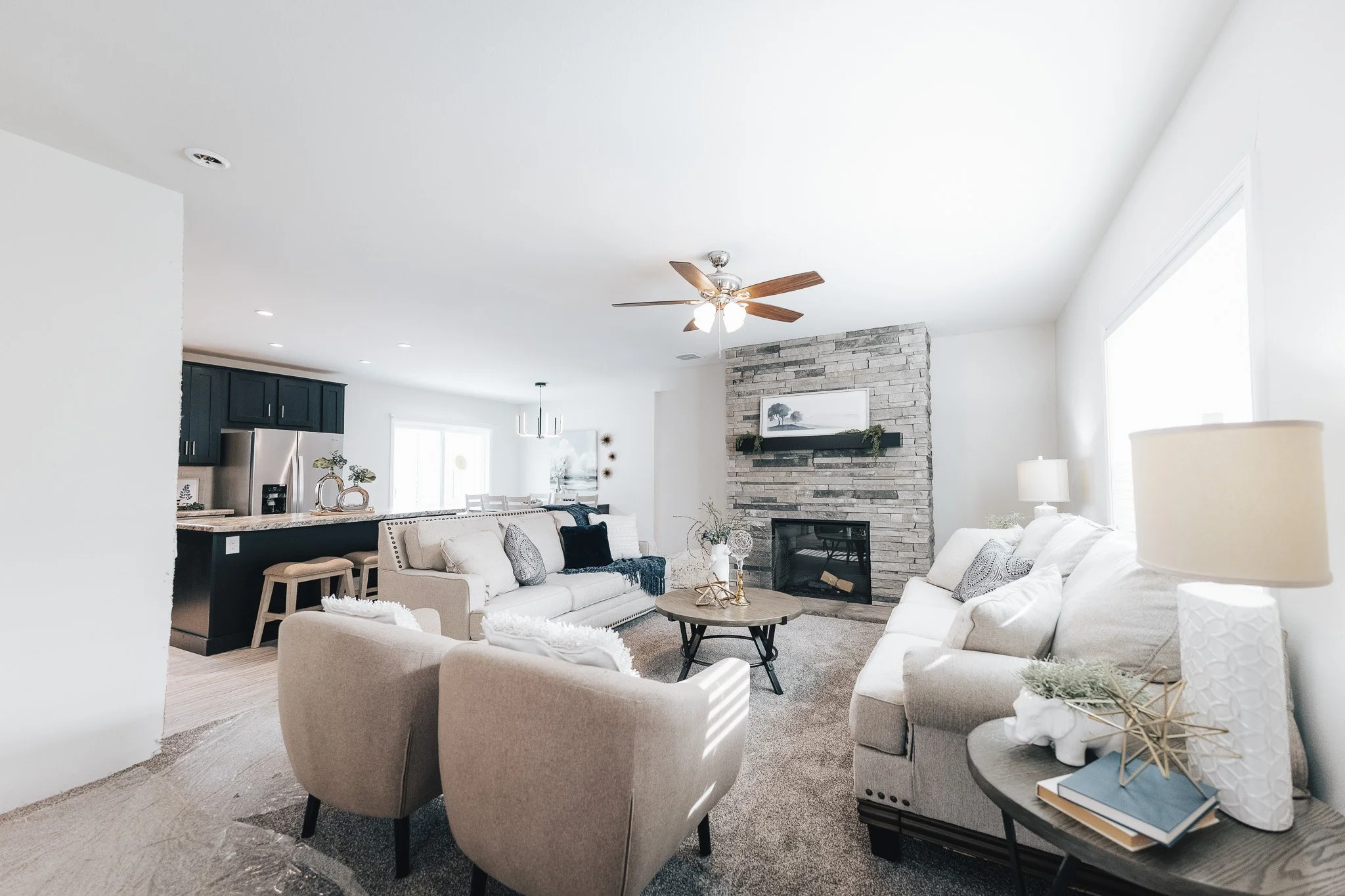 interior photo of livingroom and stone fire place in the bonnavilla 2764 premier limited 