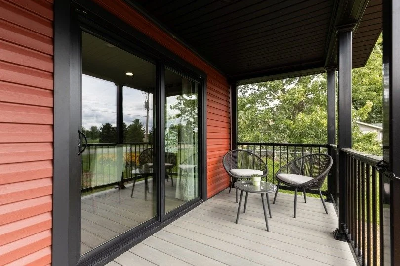 covered front porch on cavco manufactured home with sliding glass door 