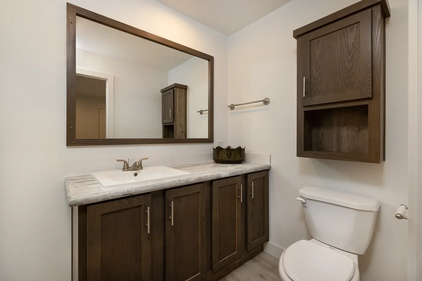 master bathroom photo with vanity and stool 