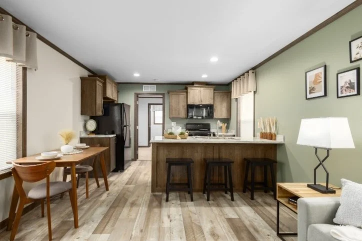 head on image of cavco edge 14663A livingroom and kitchen island 