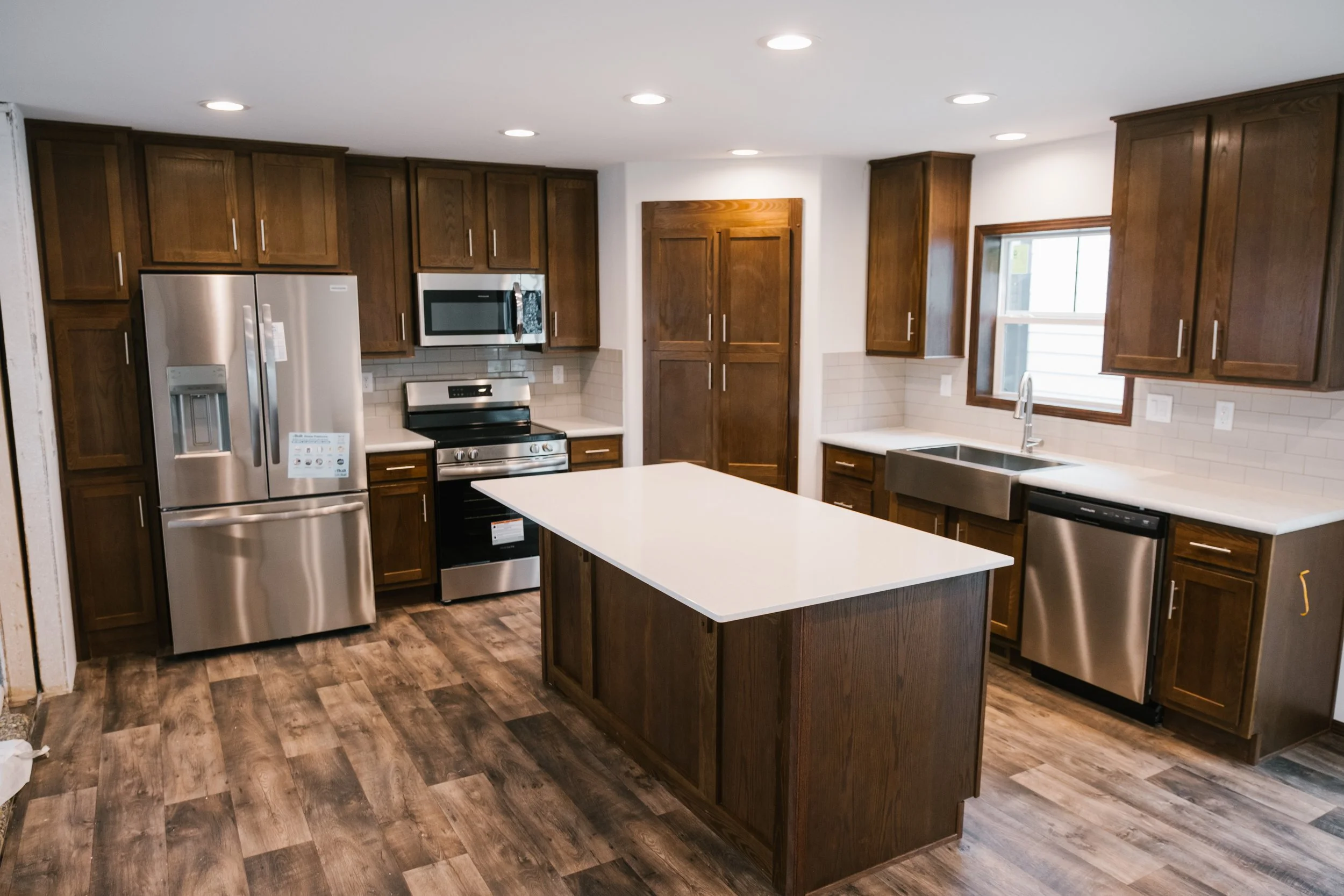 photo of schult legend 86 kitchen with brown cabits and large walk in pantry