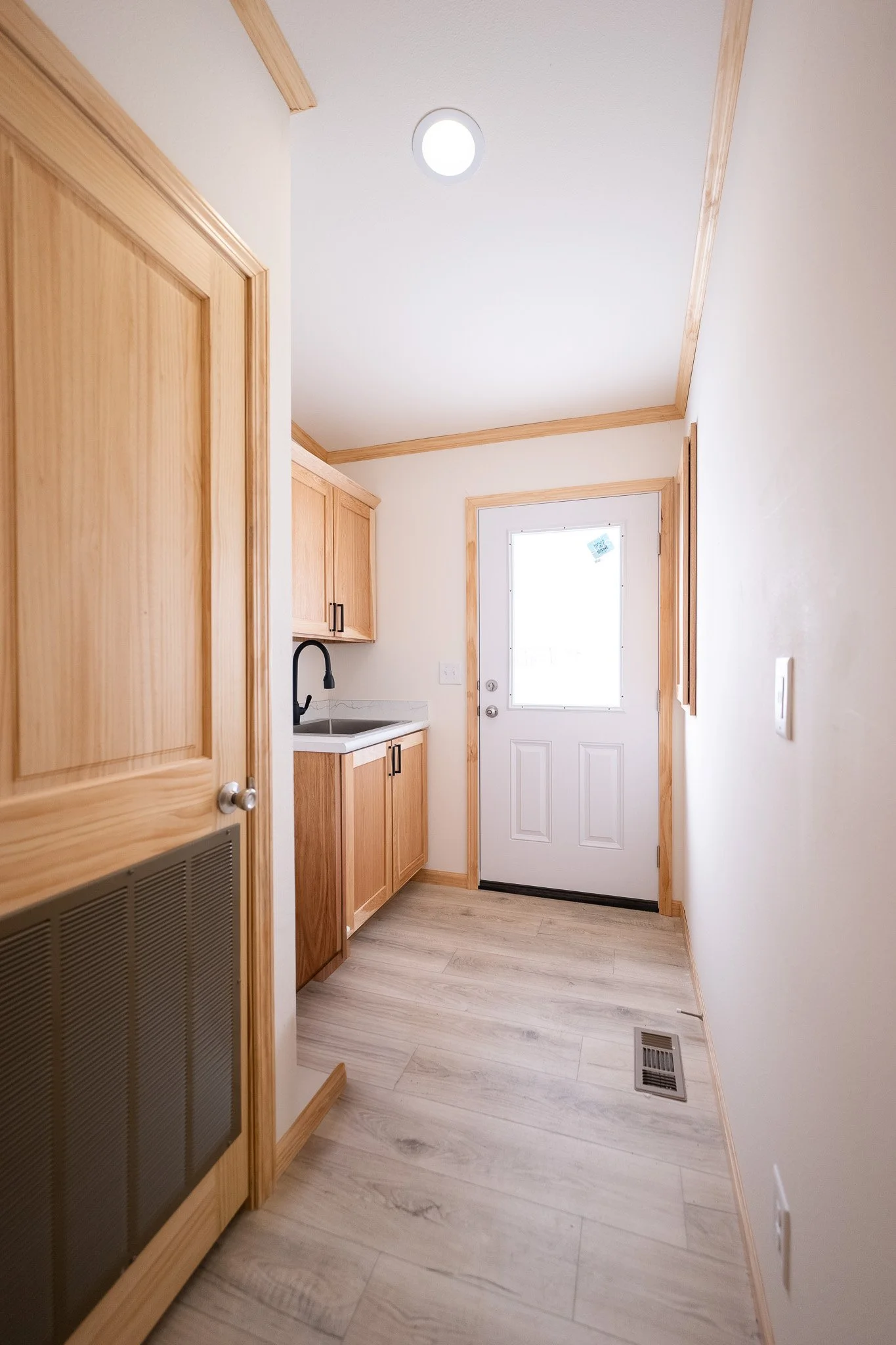 laundry room photo insid ethe cavco westlake retreat 28523E manufactured home 