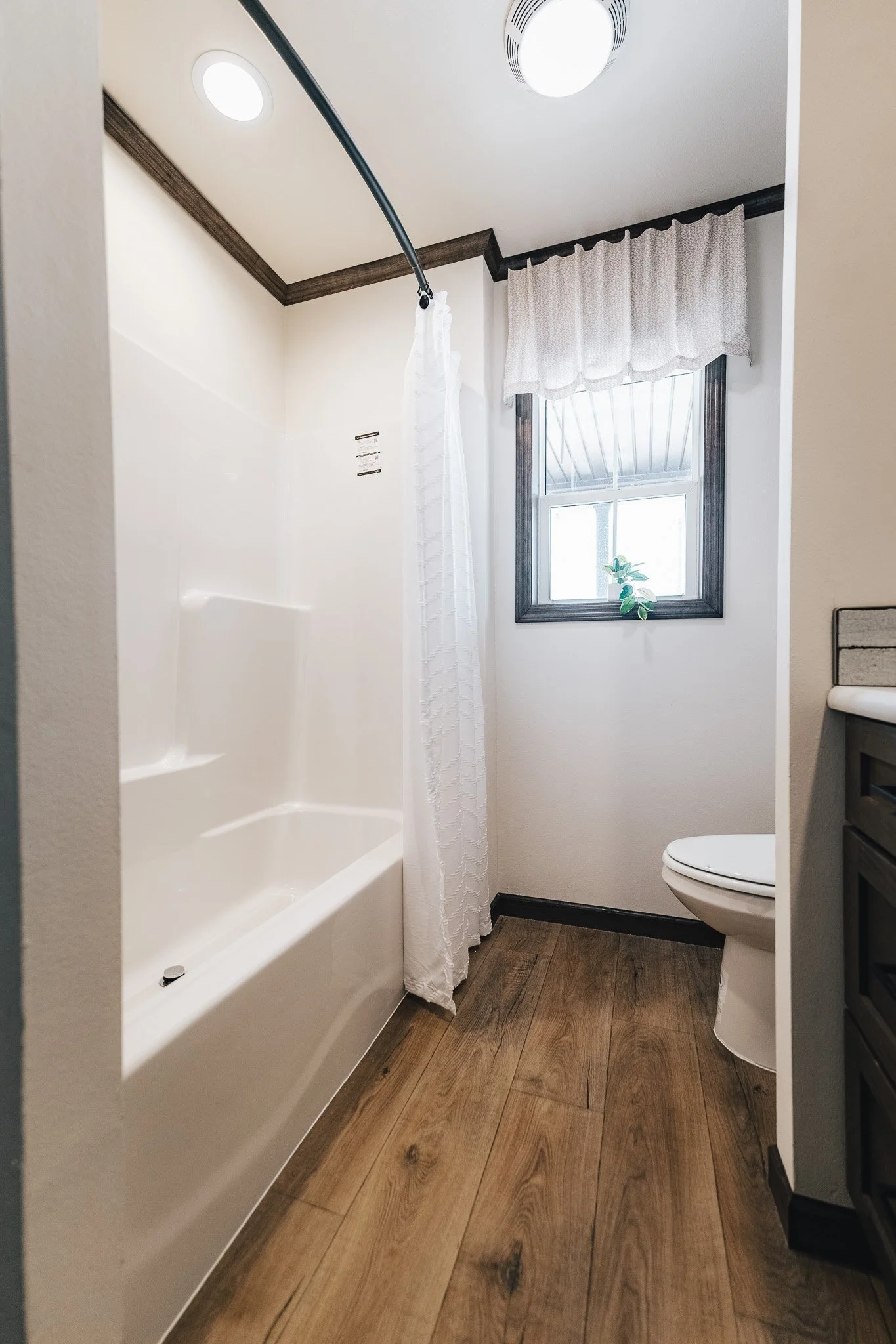 secondary tub shower in bathroom 