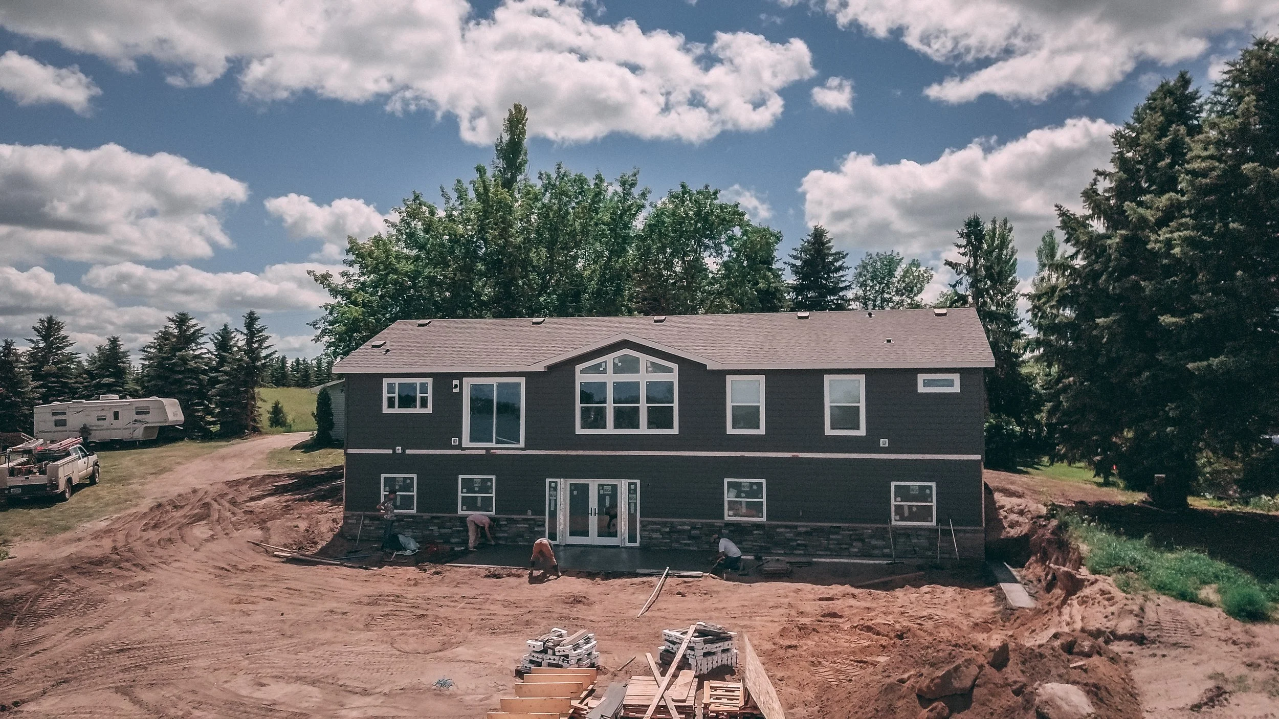 image of modular home being build on a walk out basement