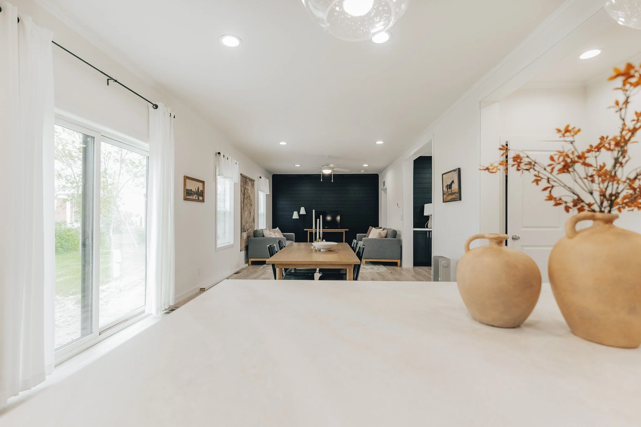 photo from counter top island looking into livingroom inside the cavco farmhouse manufactured home