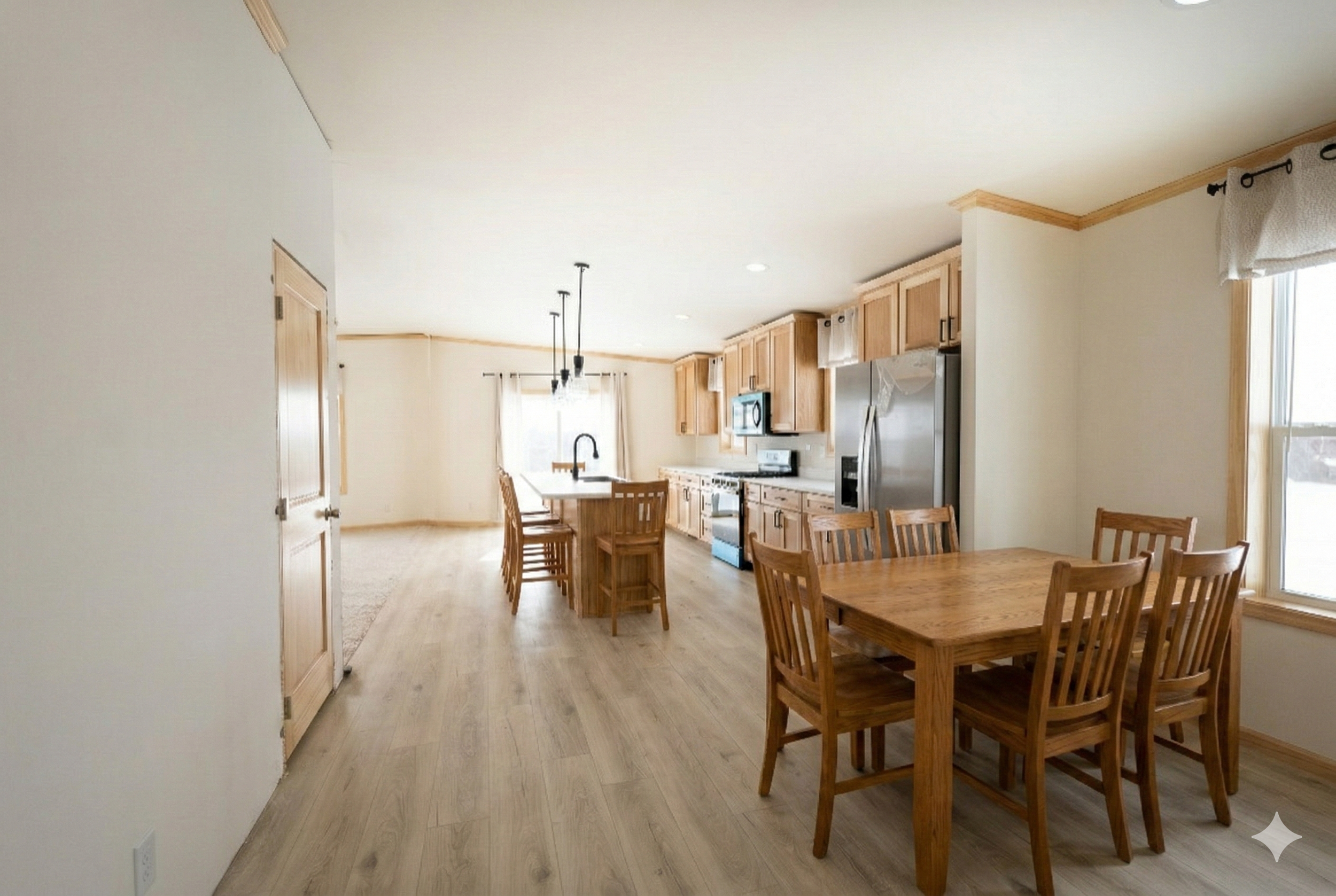 great photo of the kitchen photo with dinning-room table looking into the kitchen and in the background a nice slidding glass door