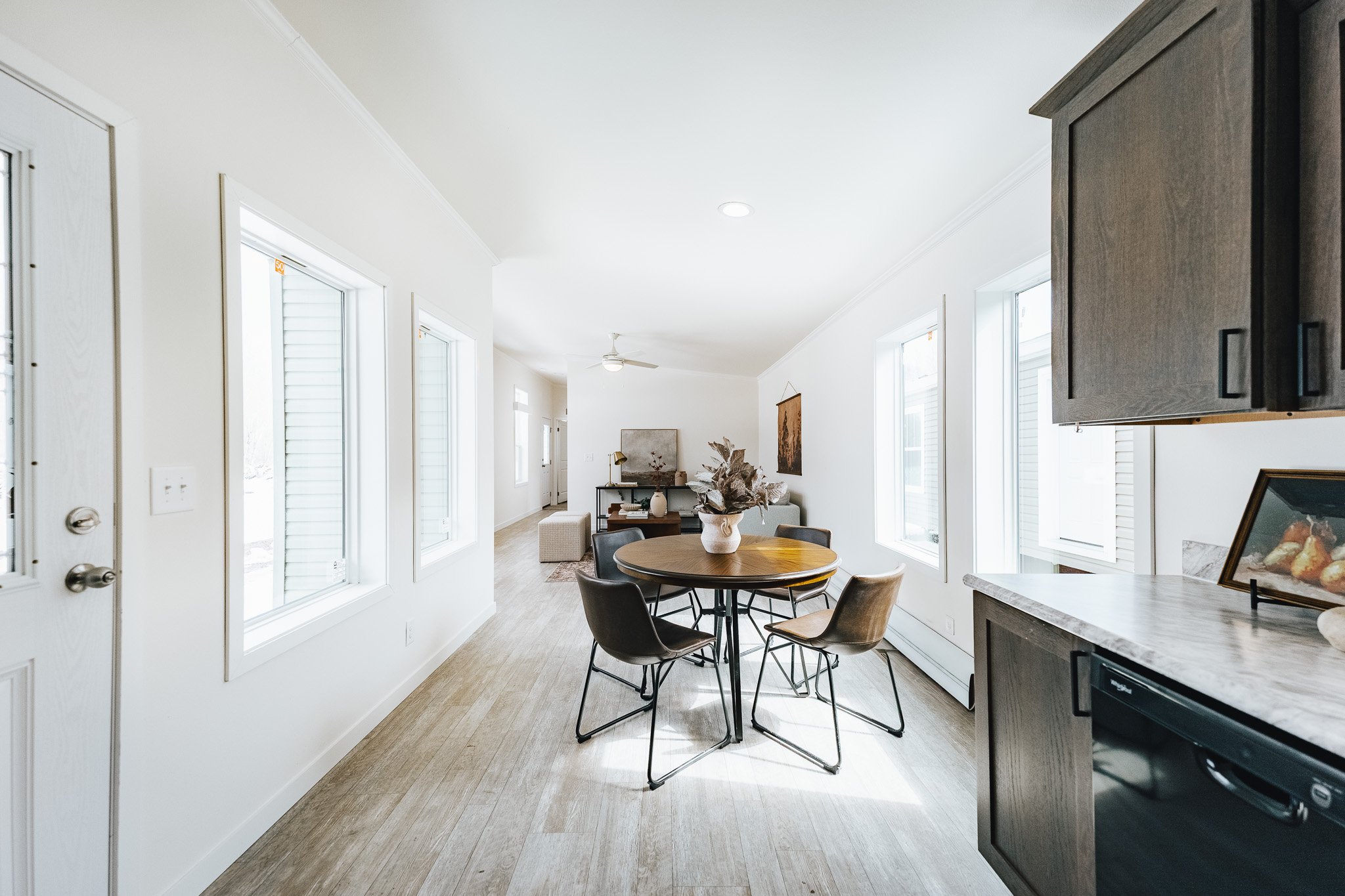 photo from the kitchen into the dinning and livingroom inside the cavco westlake ranch retreat 