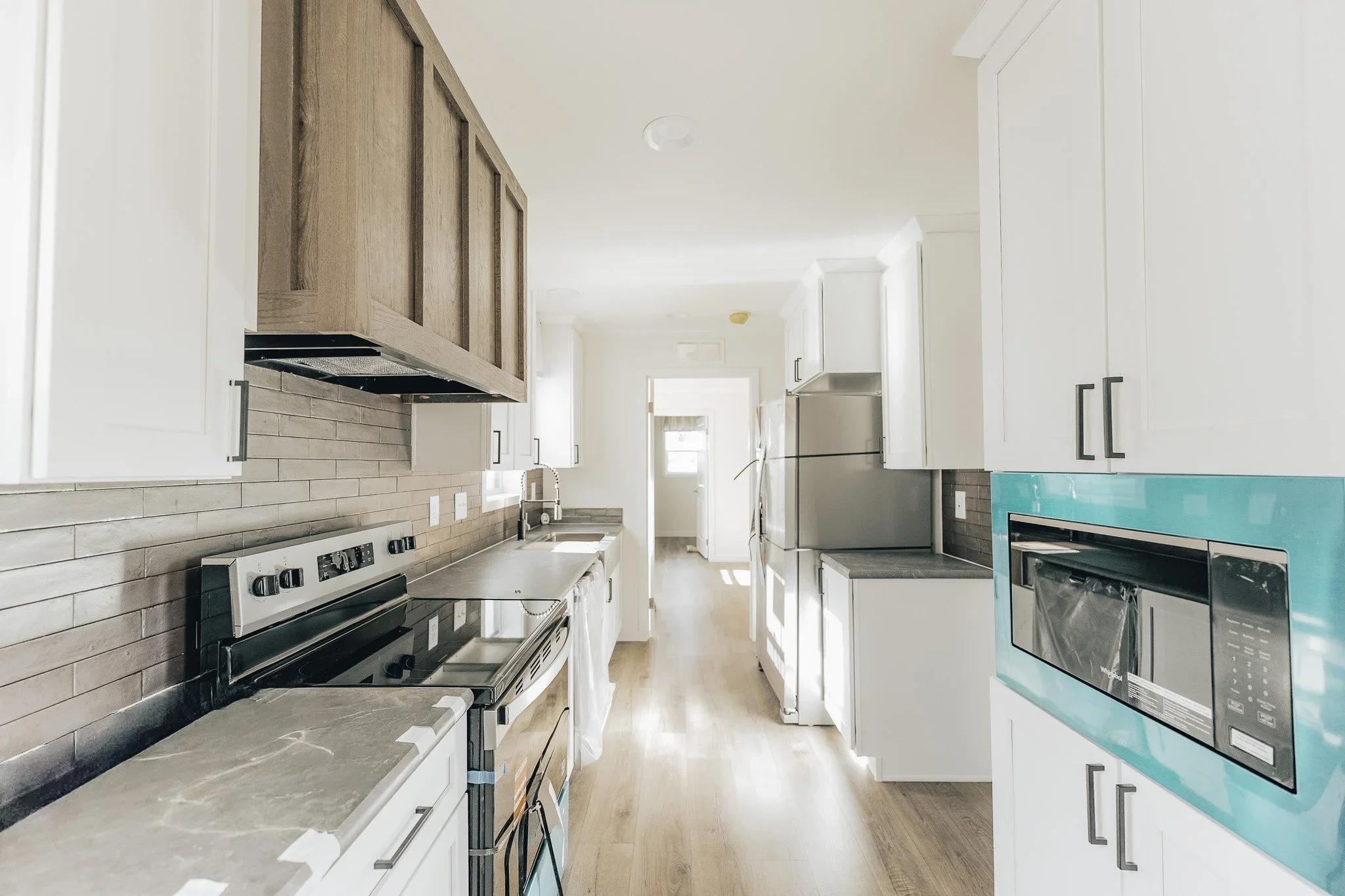 photo of the kitchen and countertops long view inside the cavco helix singlewide home 