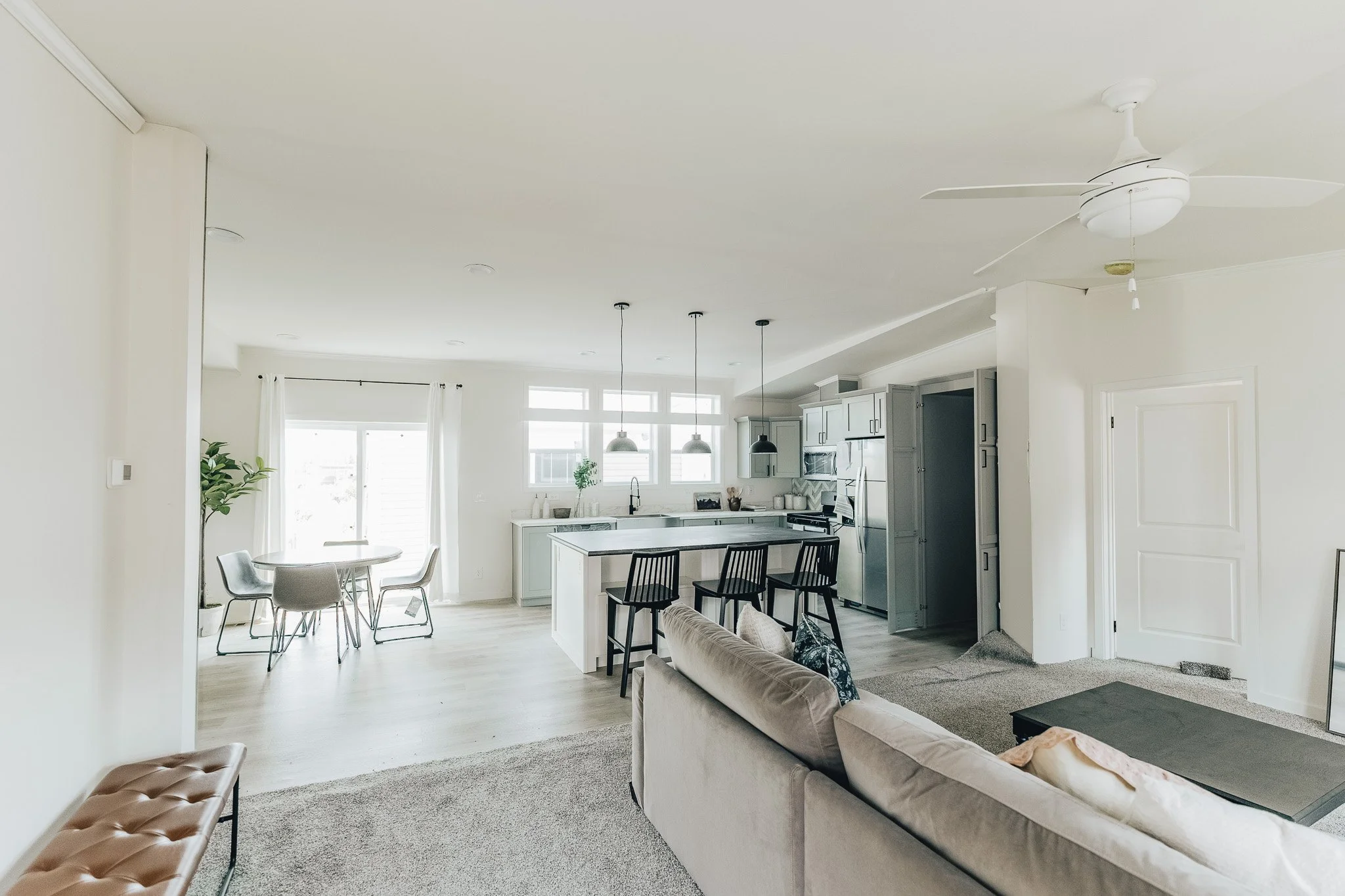 Kitchen phot with bank of windows with natural light