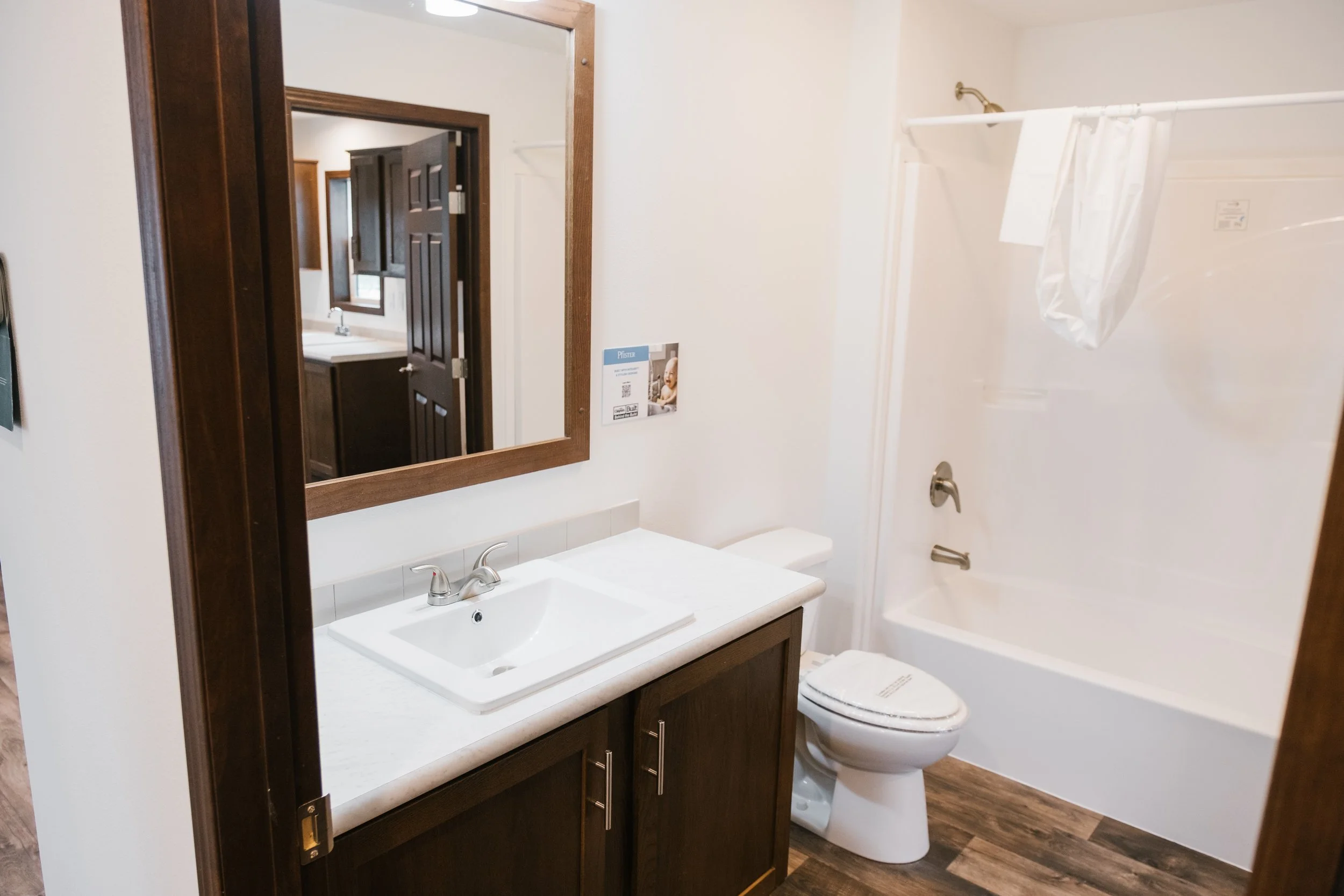 photo of secondary bathroom with shower tub combo 