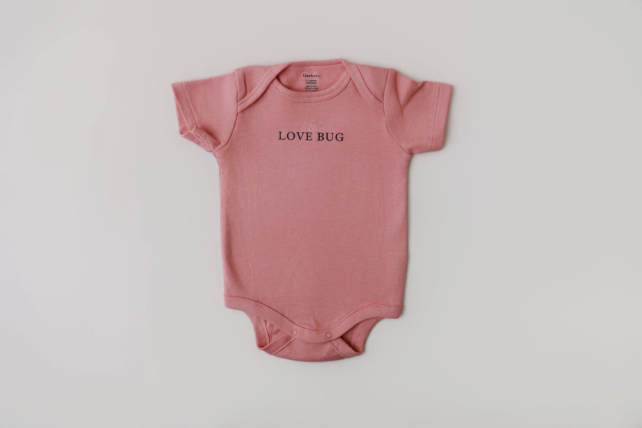Little Love Bug – 0-3 Months Short-Sleeve Onesie (Rose Pink)