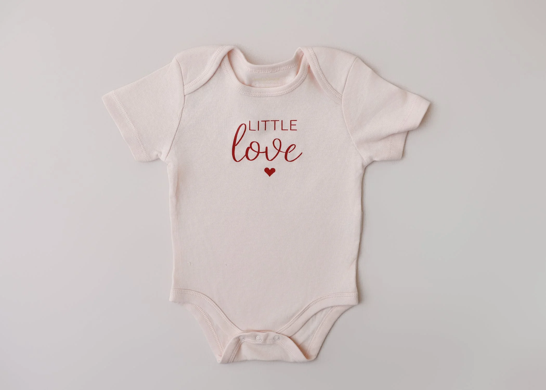 Little Love – 12 Months Valentine Onesie (Blush Pink, Short Sleeve)