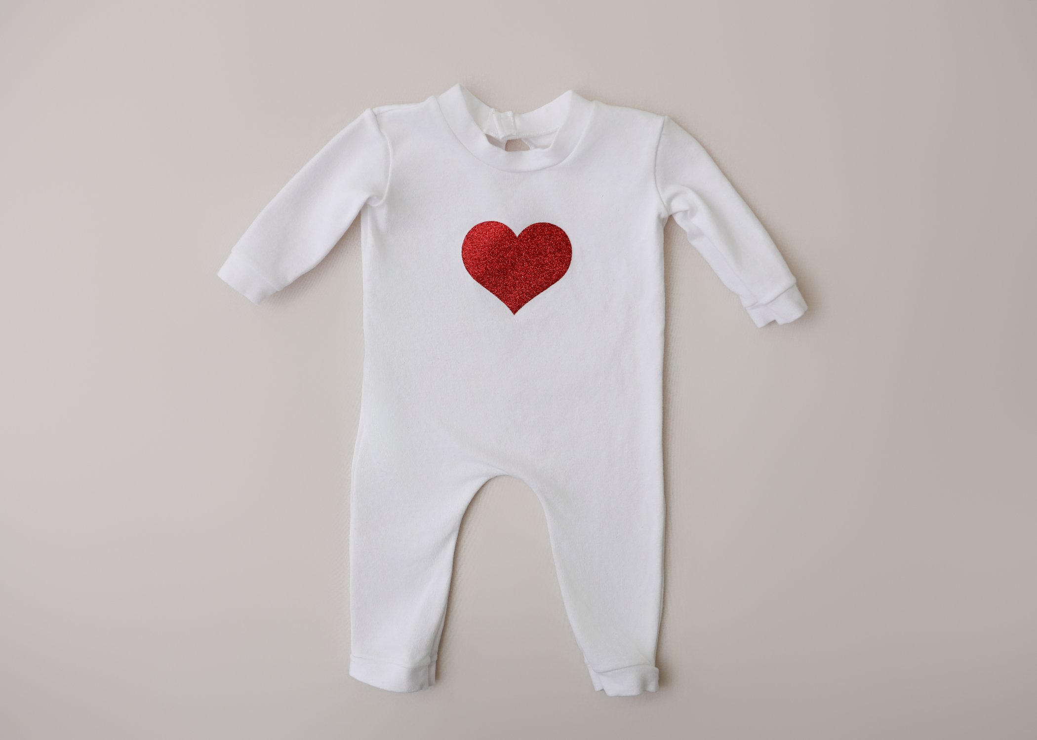 Sparkle Heart – Newborn Footed Romper