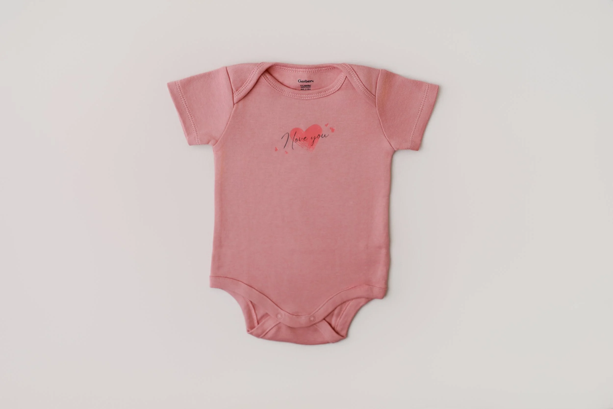 I Love You – Newborn Onesie (Blush Pink)