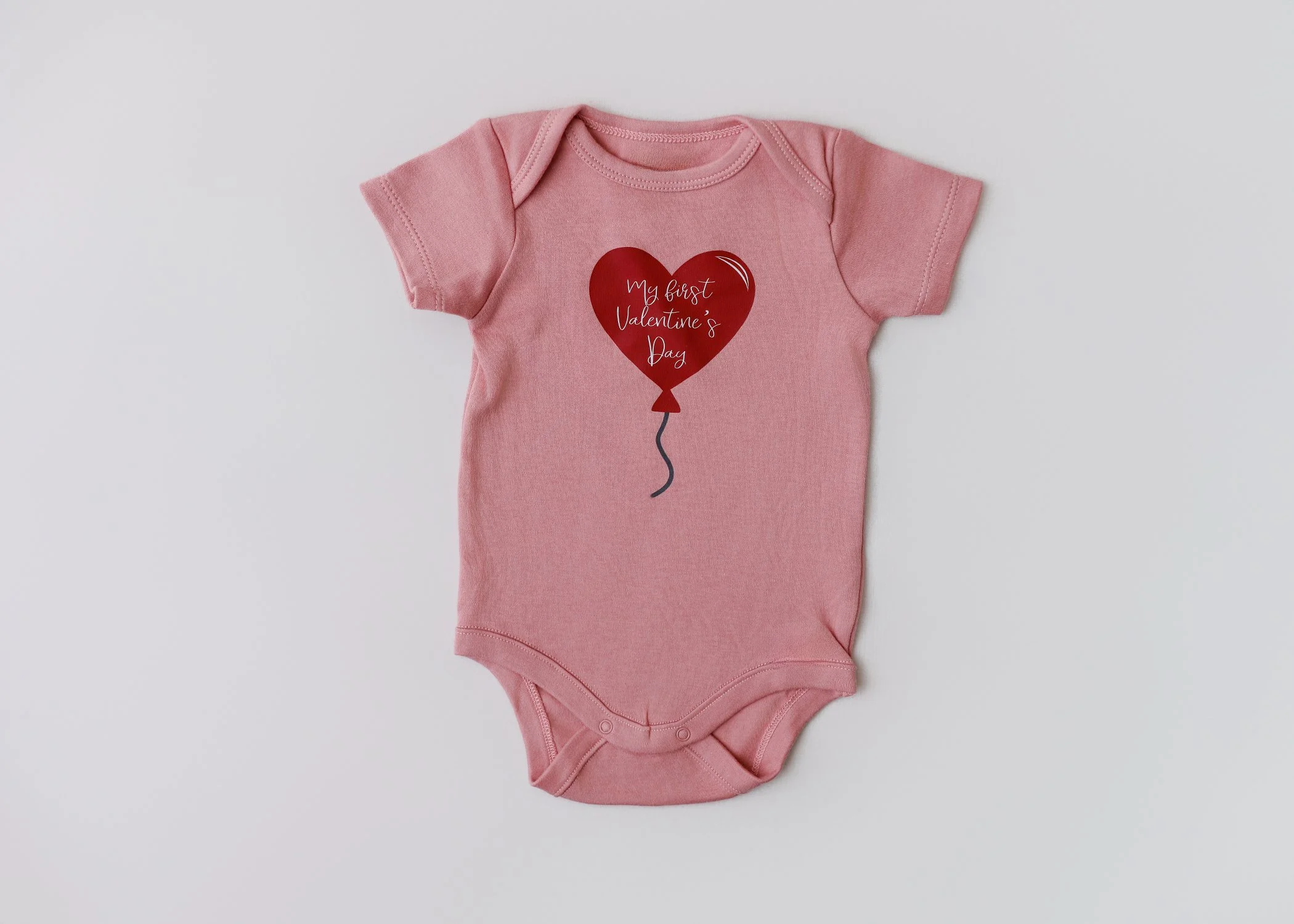 My First Valentine’s Day – 0-3 Months Onesie (Blush Pink, Short Sleeve)