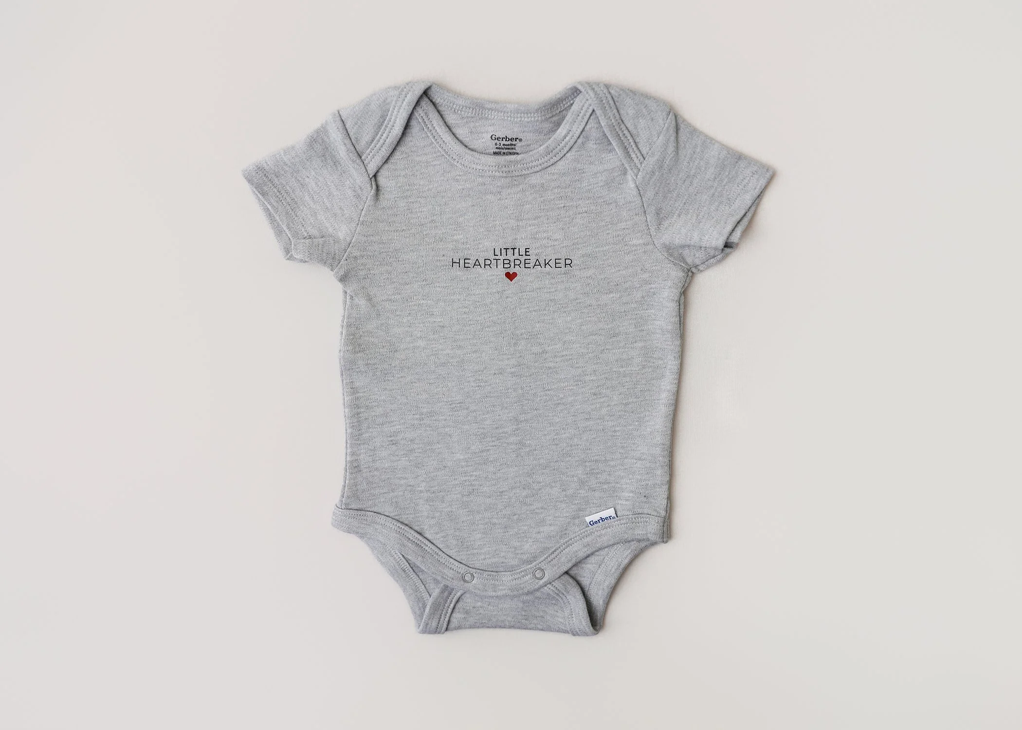 Little Heartbreaker – 0-3 Month Short-Sleeve Onesie (Grey)