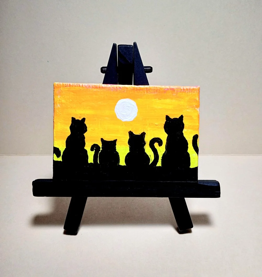 four sunset cats.jpg