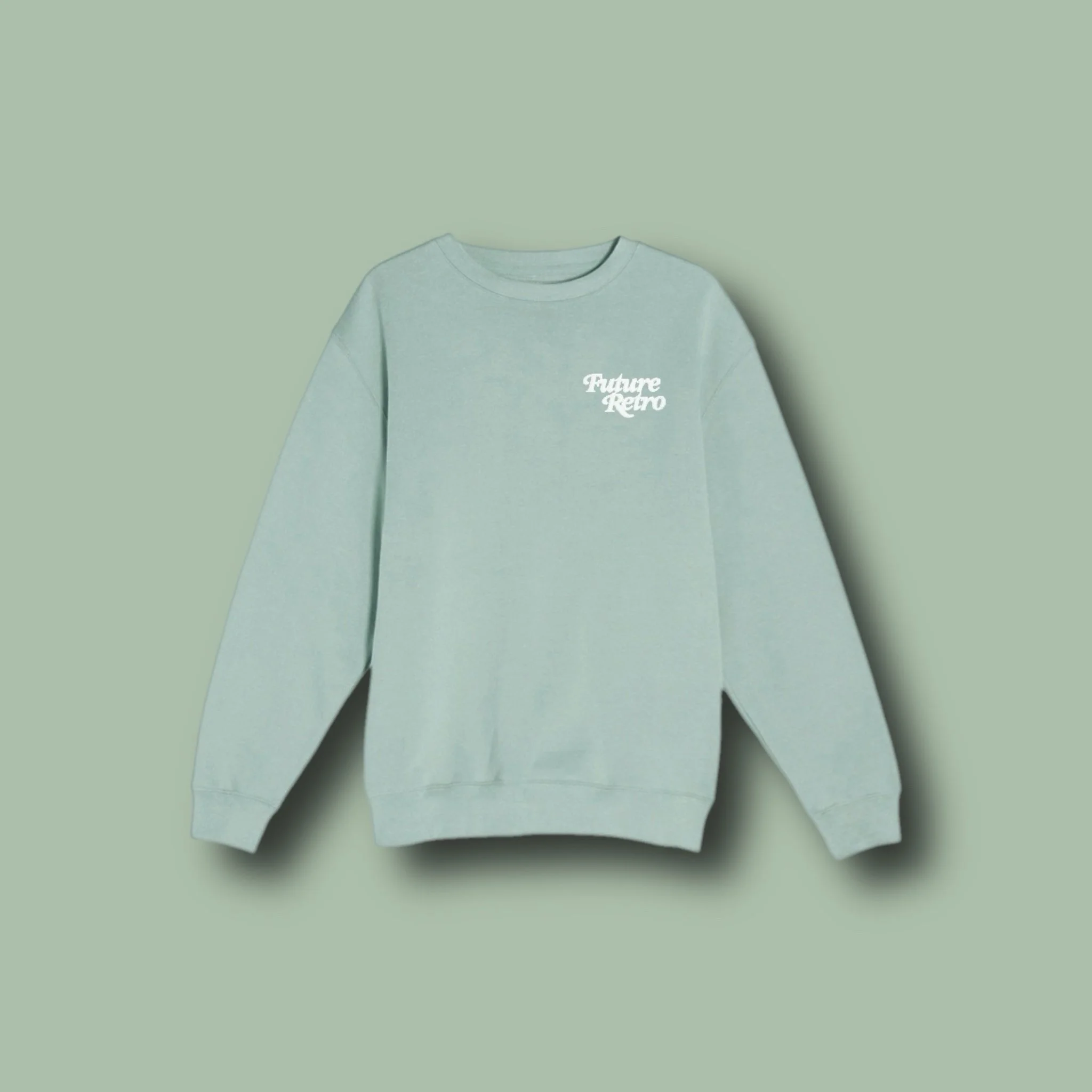 Light green sweatshirt with white text 'Future Retro' on the upper left chest area, against a light green background.