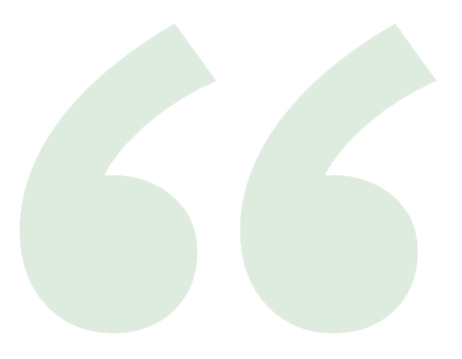 Large light green quotation marks on a blank background.