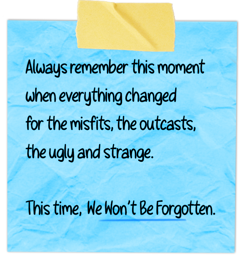 Blue crumpled paper with printed text taped with a yellow piece of tape.