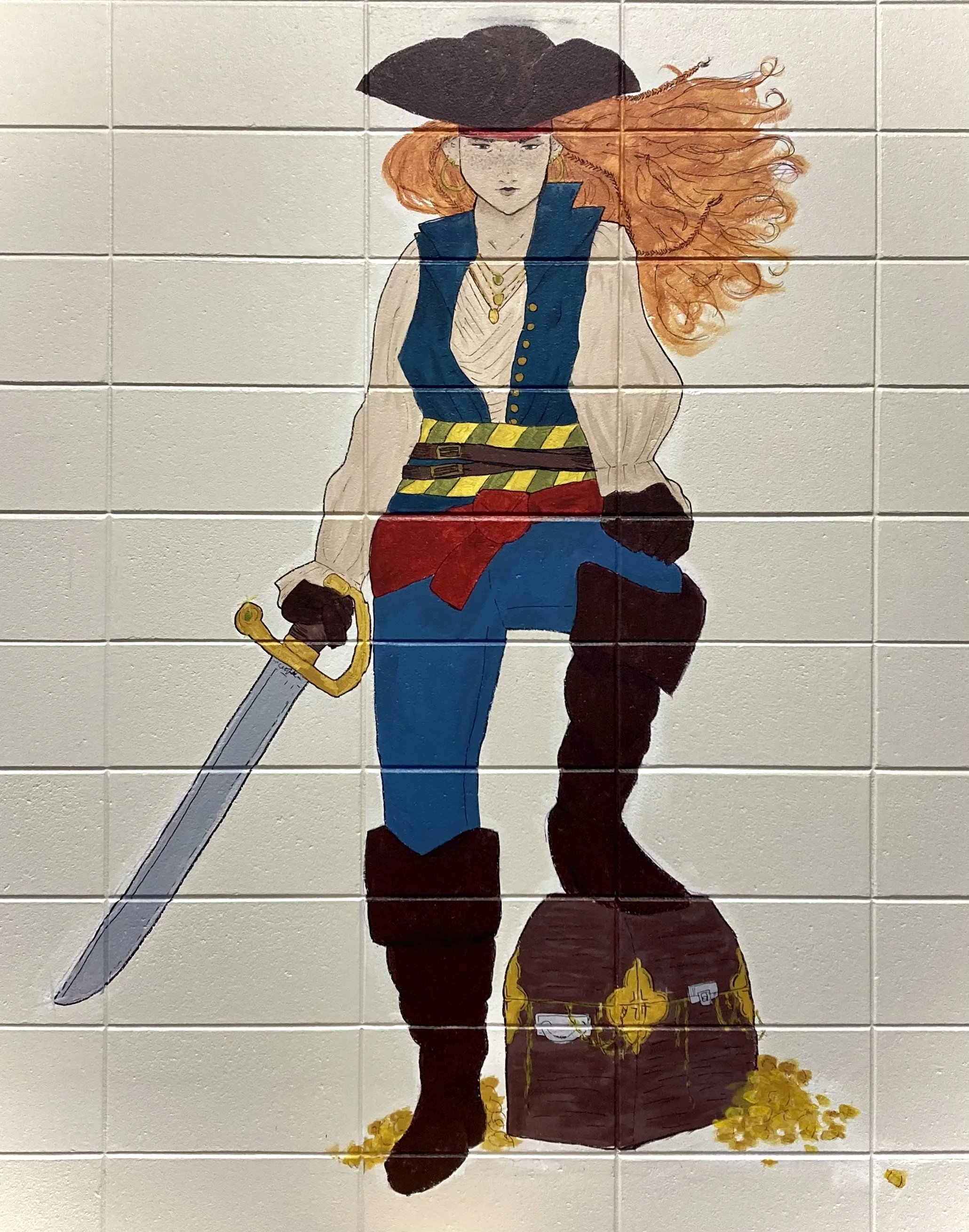 Mural of a female pirate with a sword and treasure chest