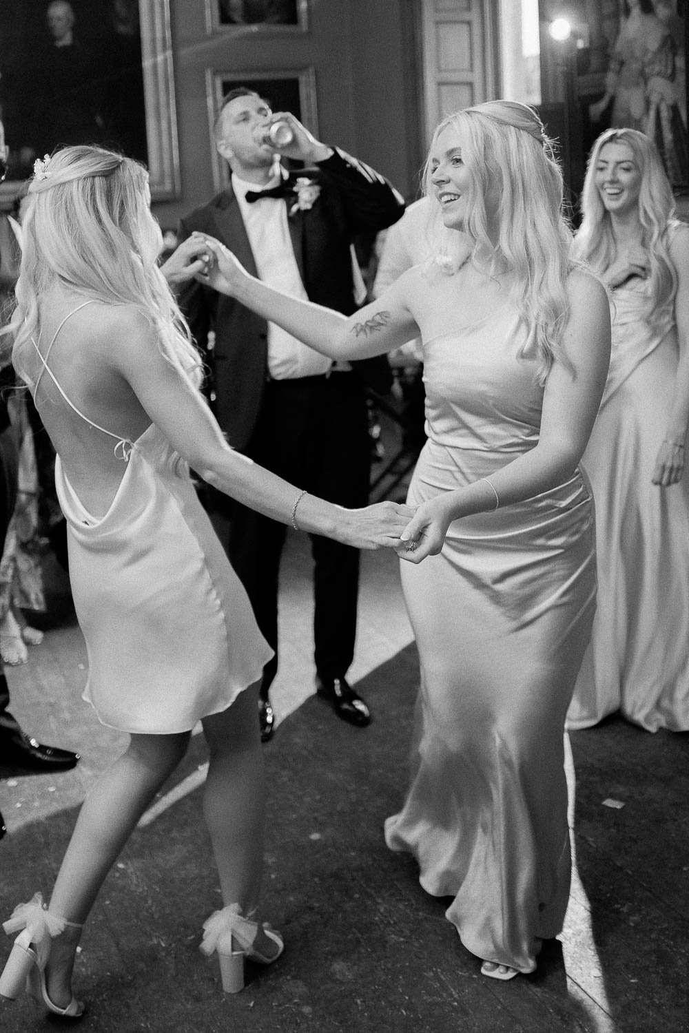 bride dancing with her friends