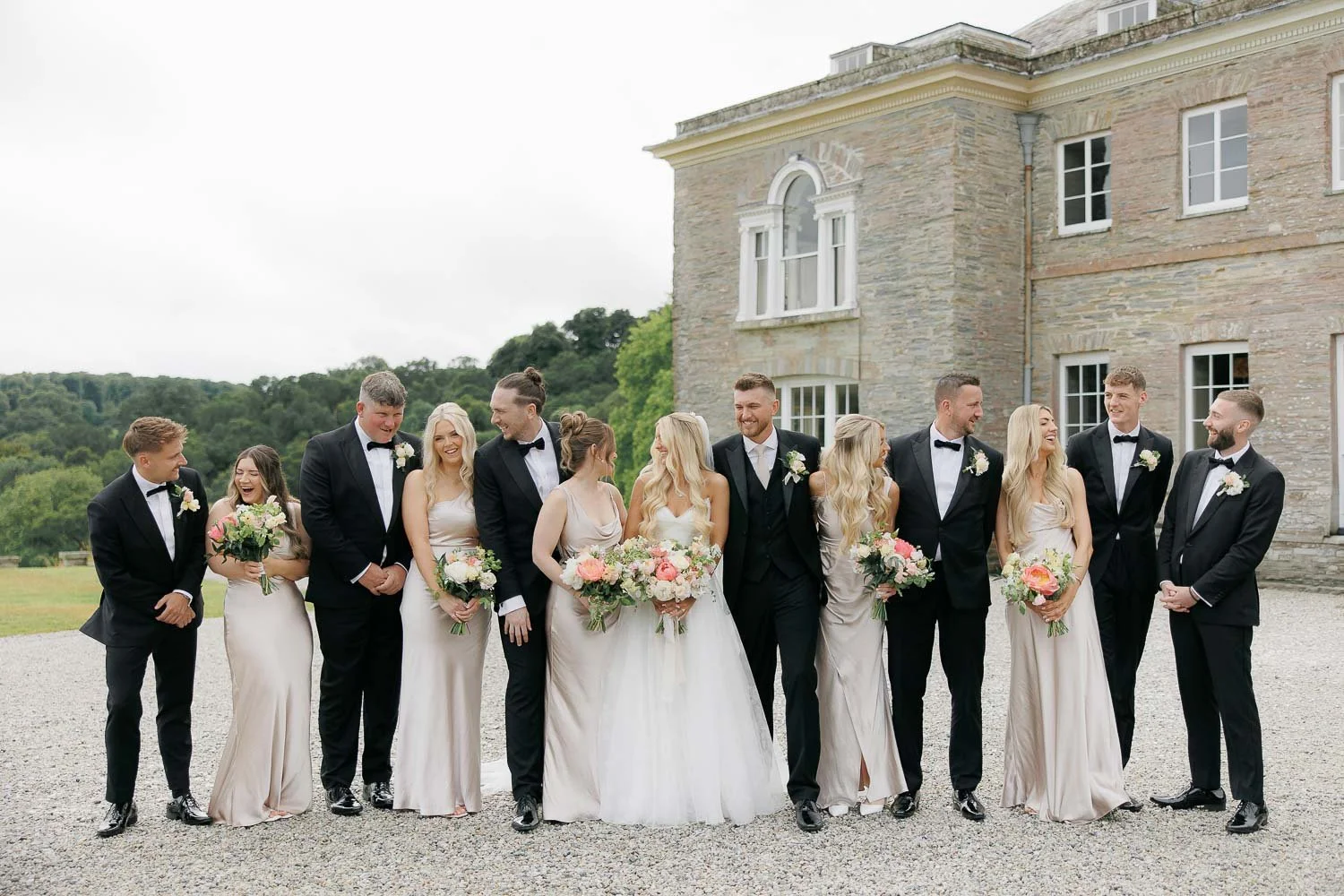 the bridal party in front of boconnoc estate