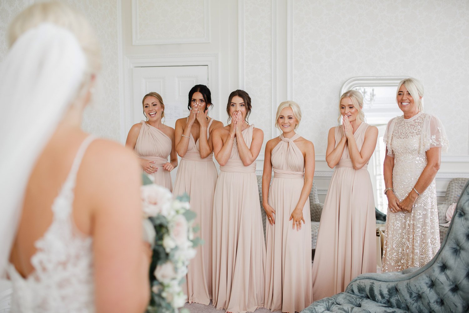 bridesmaids reacting to bride