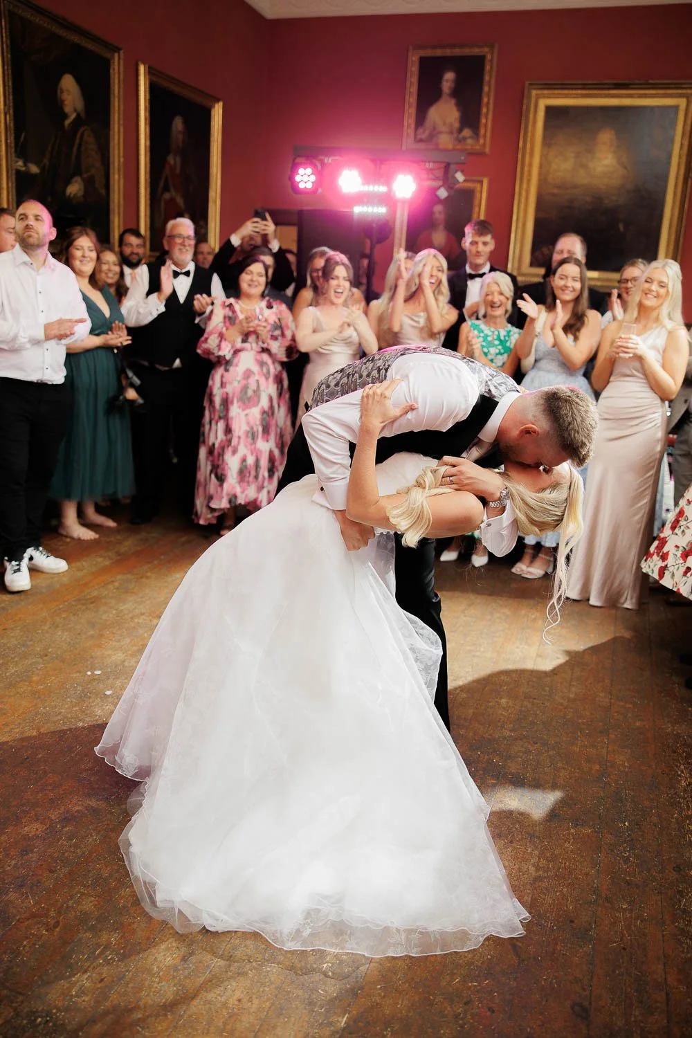 bride and groom first dance at Boconnoc in red room