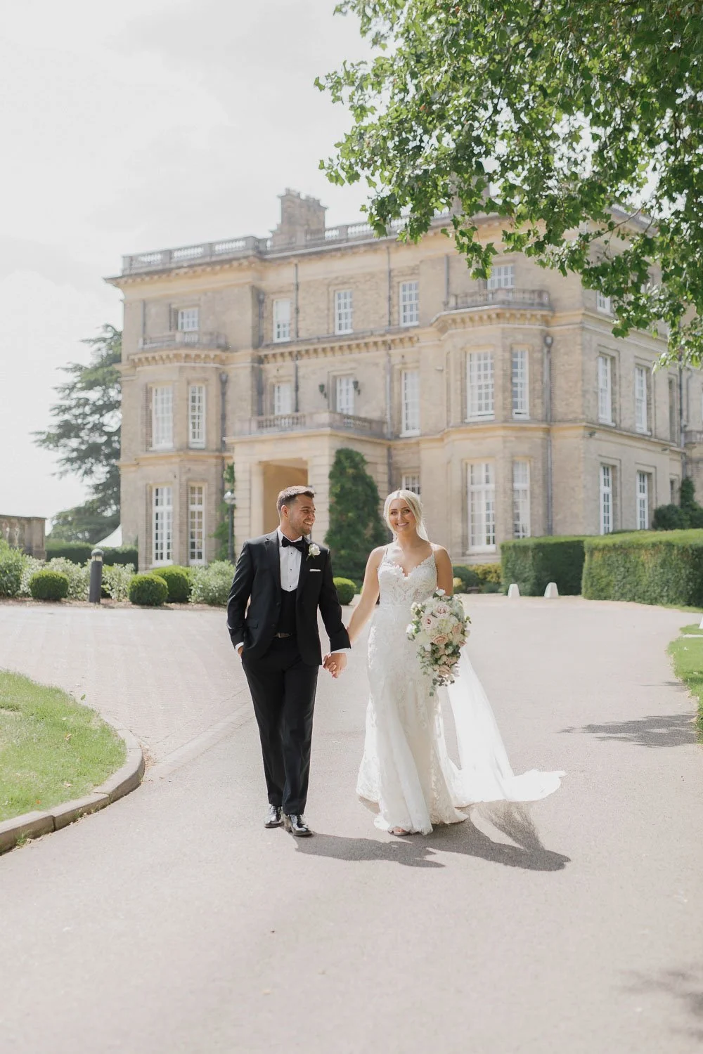 Bride and groom outside Hedsor House, Buckinghamshire