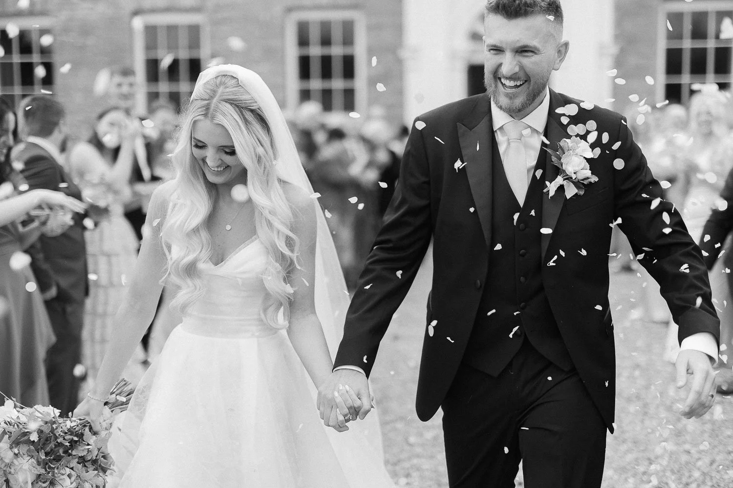 black and white confetti throwing photo