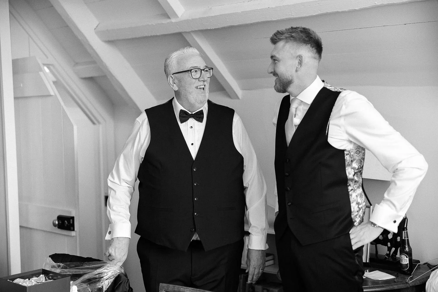 Groom and dad having a moment before ceremony