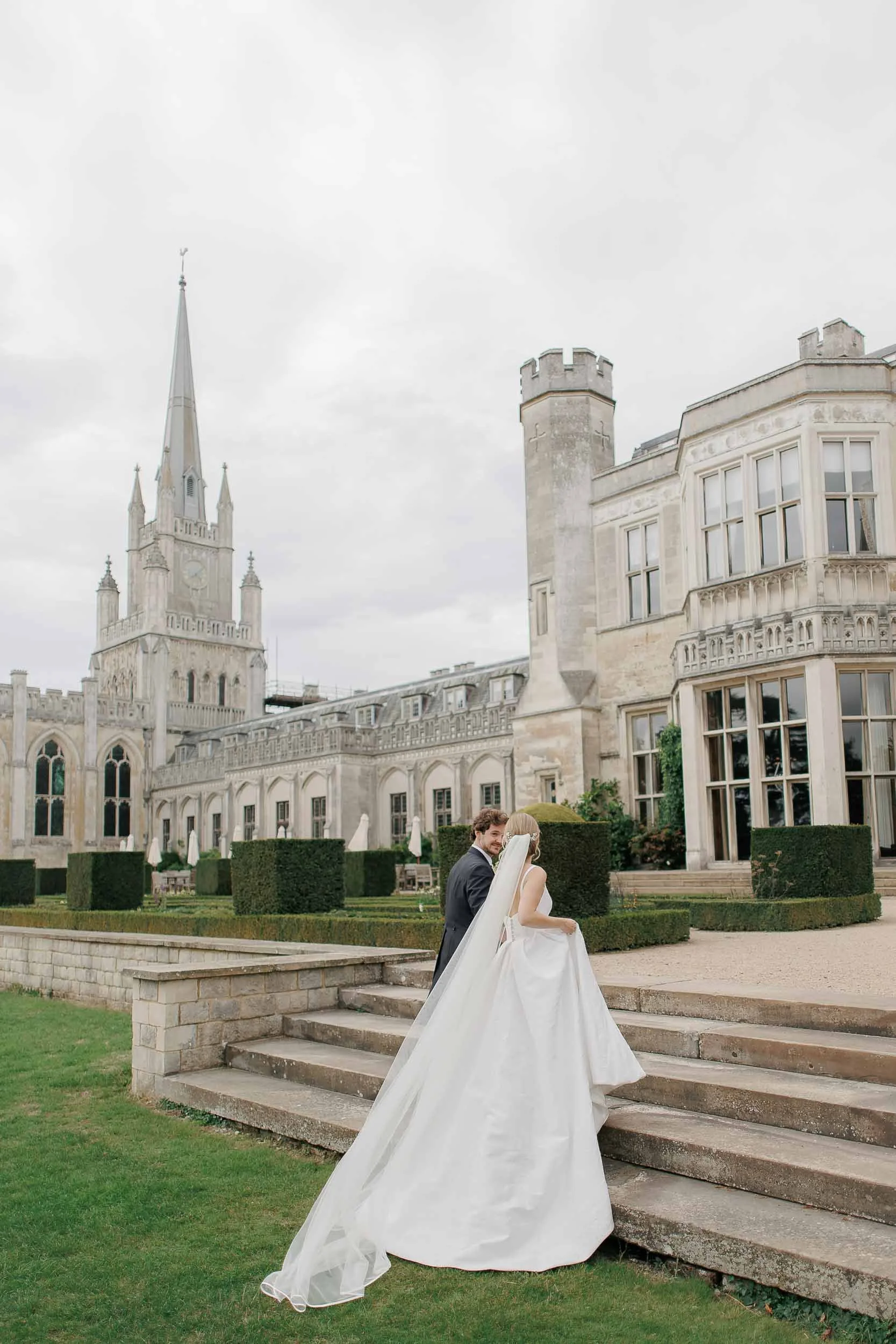 Wedding couple in the gardens at Ashridge House, Hertfordshire