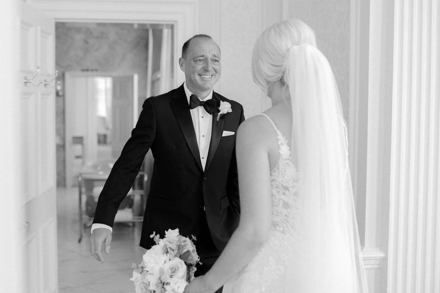 Father of bride emotional in bridal suite of Hedsor