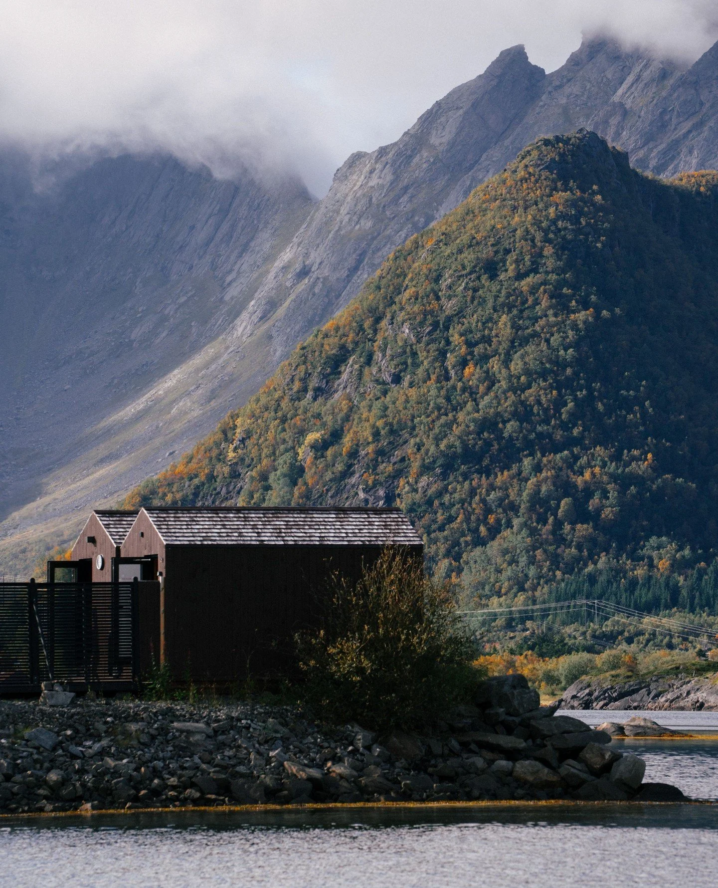 One of our favourite times of the year in Lofoten.⁠
⁠
A bit quieter, a bit colder, and probably a bit better.⁠
⁠
Golden mountains, crisp air, calm water and Sk&aring;rungen right in the middle of it all.