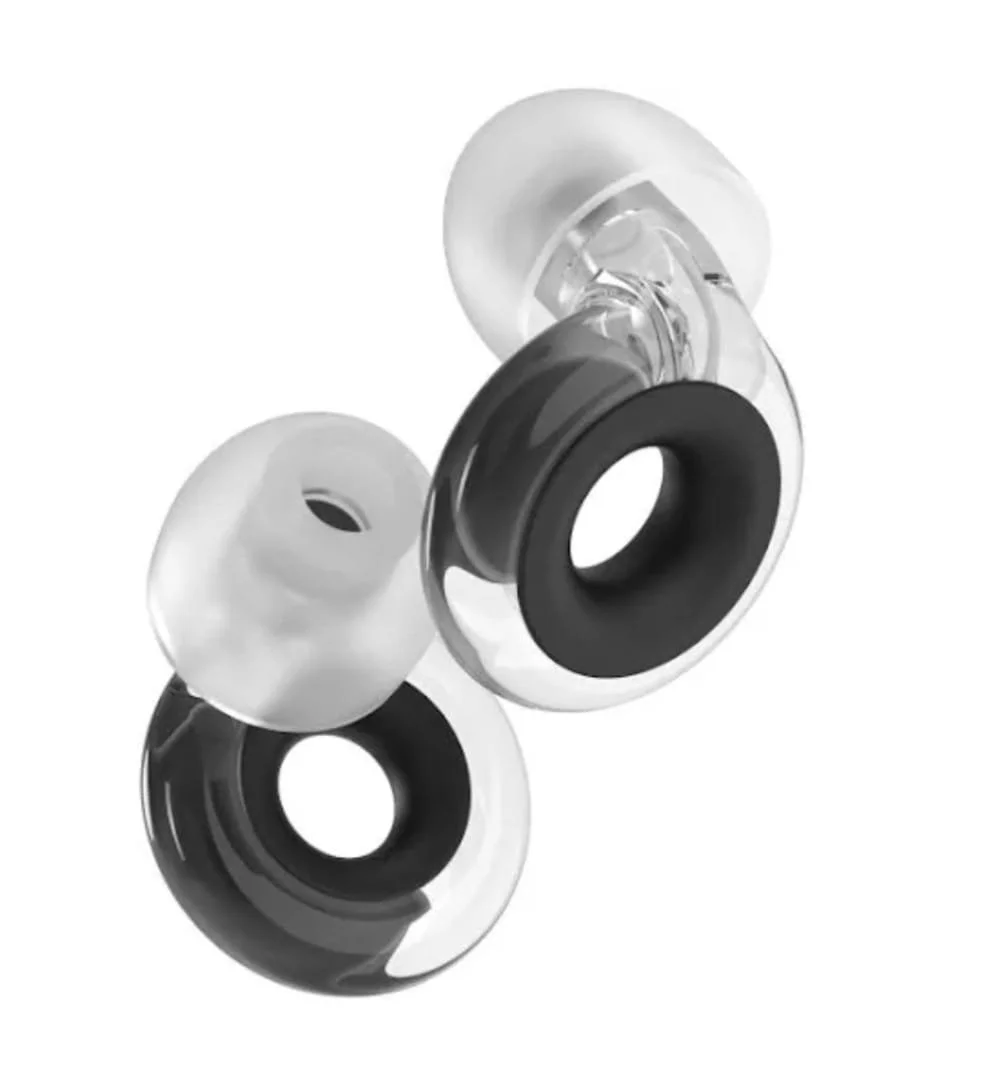 A collection of transparent and black earbud ear tips, some with foam and silicone materials, arranged in a close-up view.
