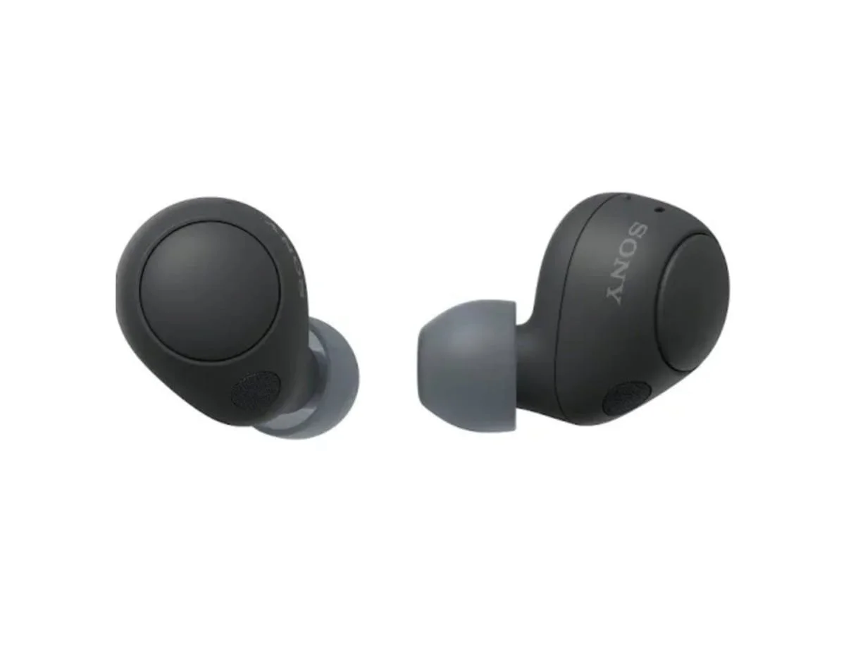 Wireless black and gray Sony earbuds against a white background.