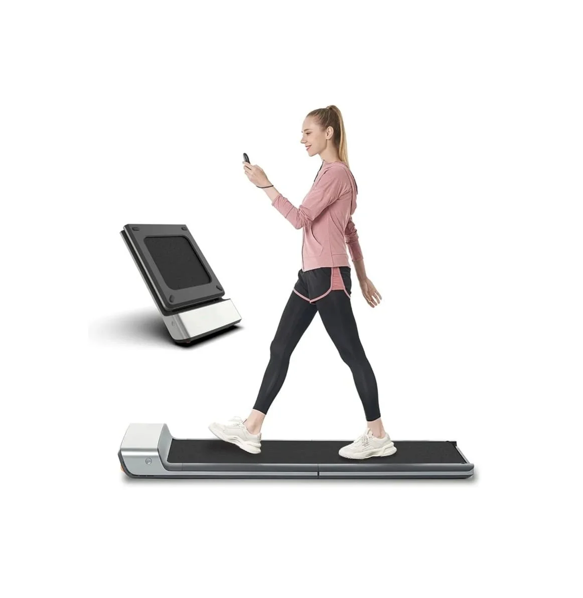 Woman walking on a treadmill while looking at her phone and using a smartwatch, with a digital scale nearby.