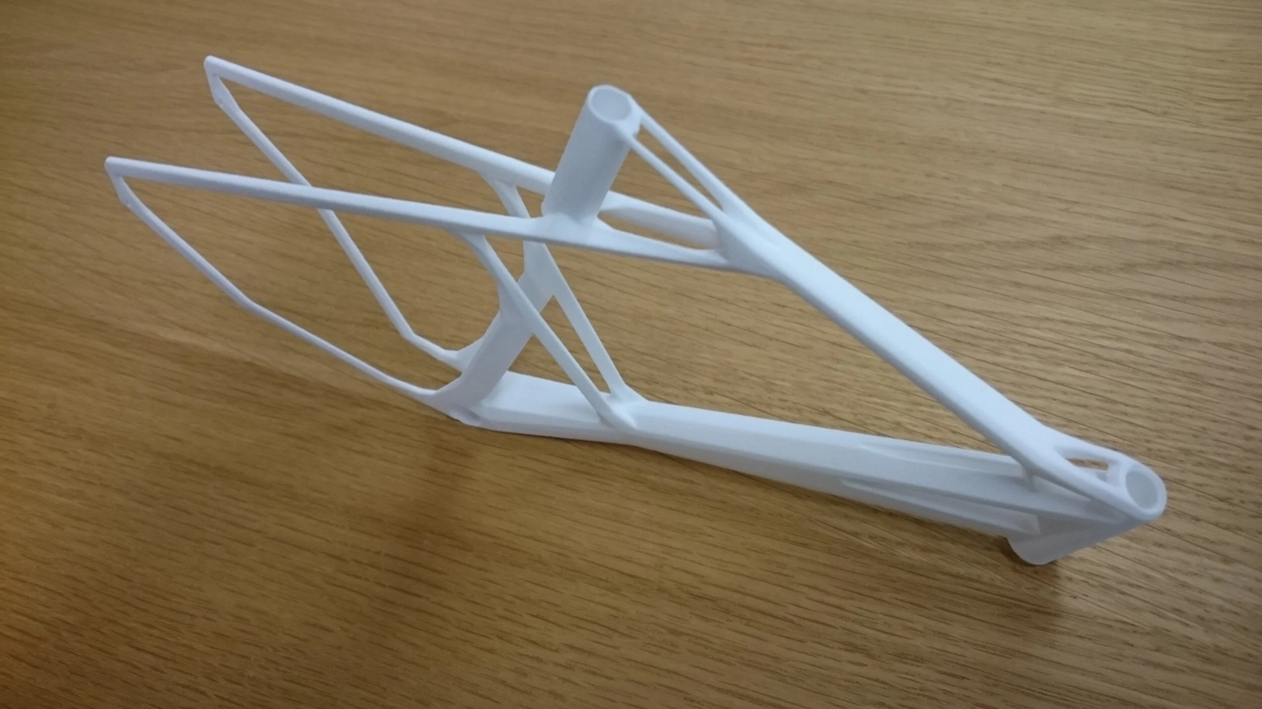 A model of the design was made. However the modelling quality would have to be improved for a working bicycle. Due to software constraints and weight of the part the design was further simplified.