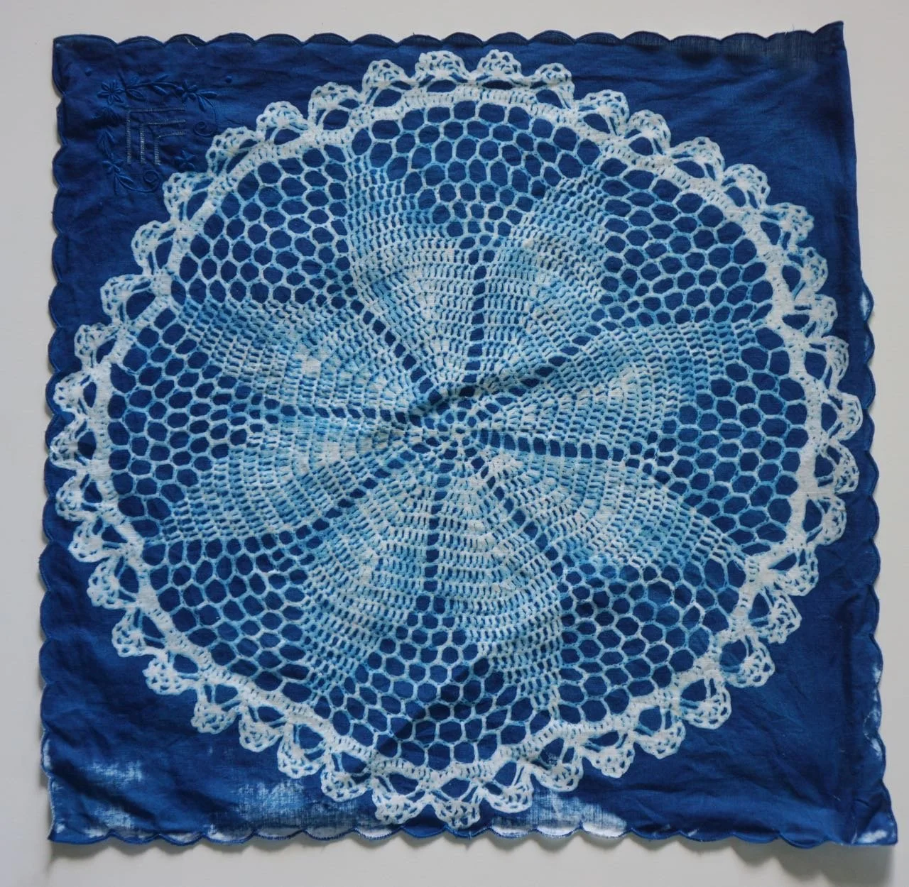 cyanotype of doily on linen napkin