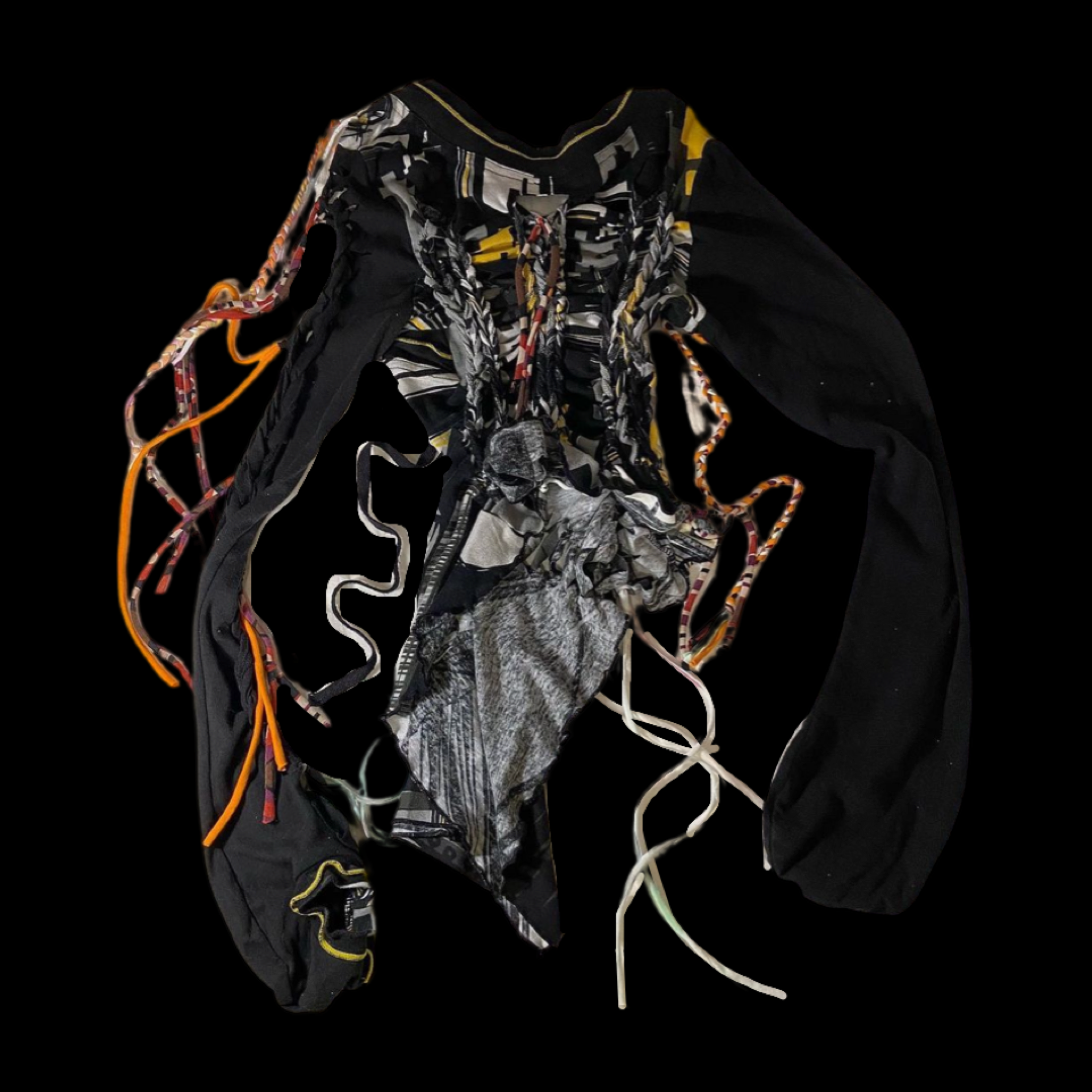A tangled mess of multicolored cords and black fabric with a patterned inner lining.