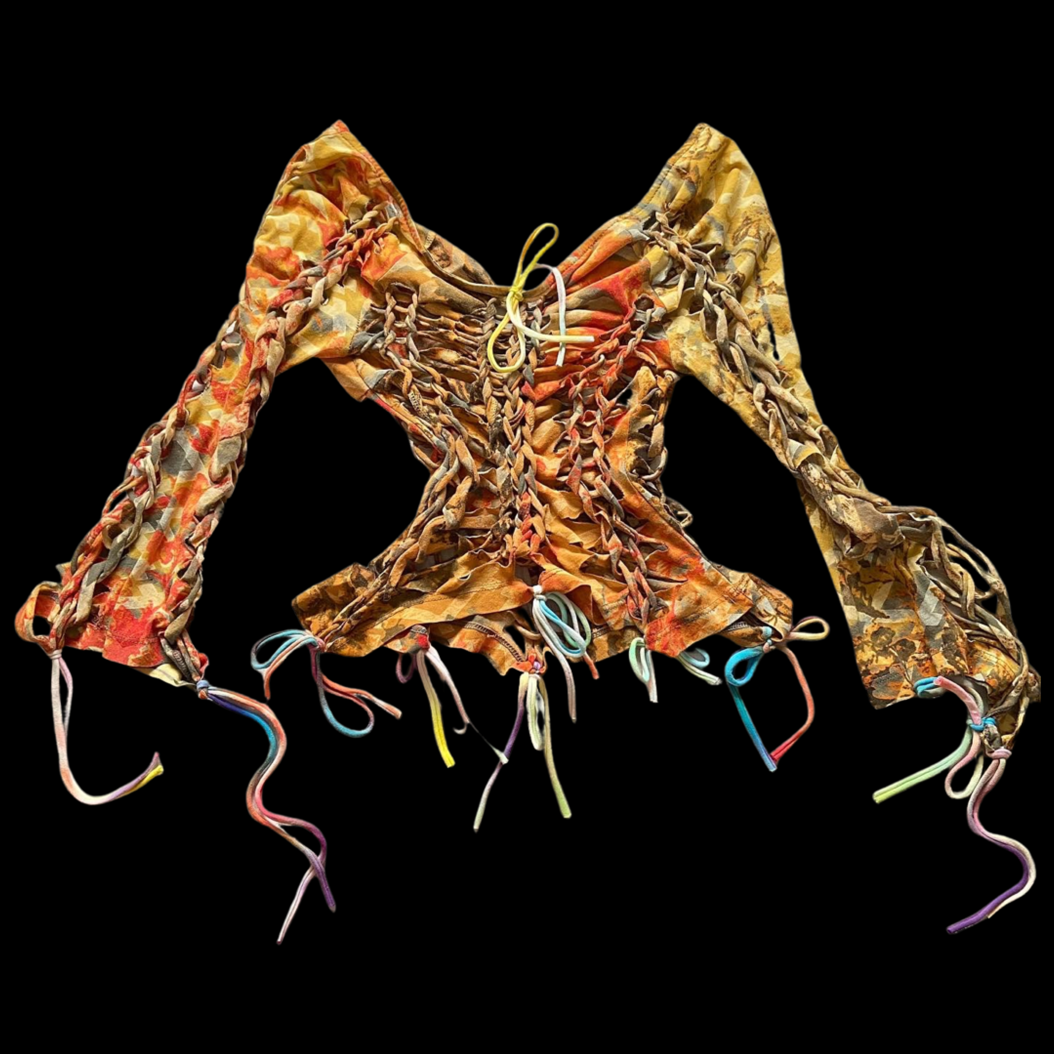 A colorful, patterned, long-sleeved blouse with laced-up front and multicolored tie strings hanging from the sleeves and bottom hem, displayed against a black background.