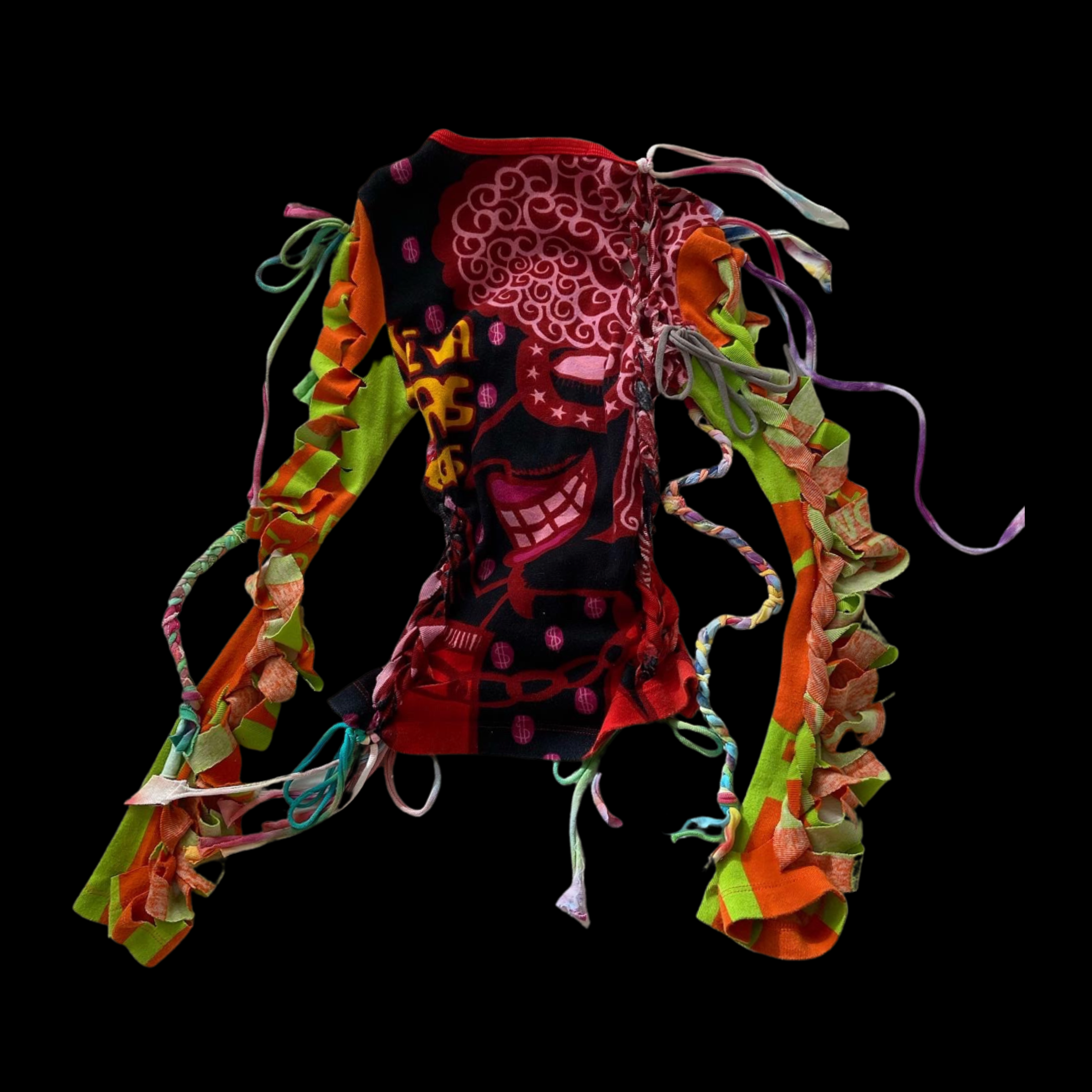 Colorful fabric face mask with ruffled straps and graffiti-style design against a black background.